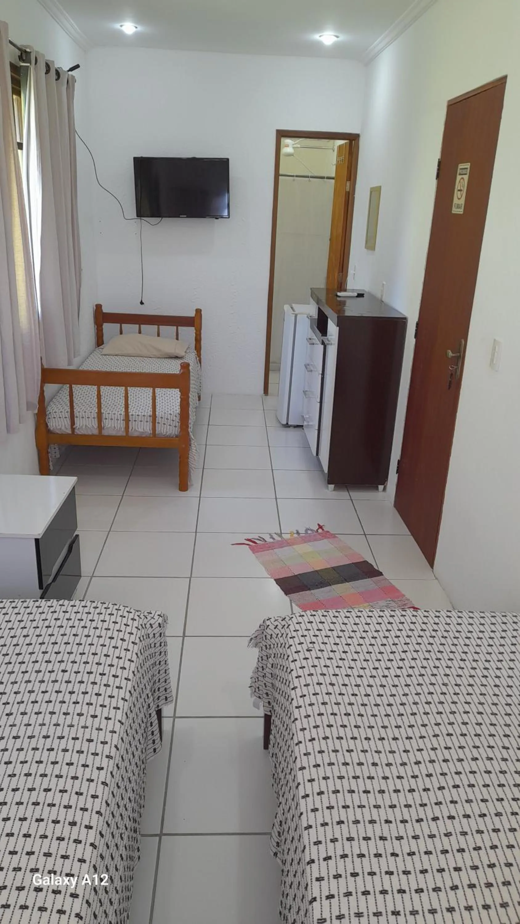 Photo of the whole room, Bed in Hospedaria Casa de Maria