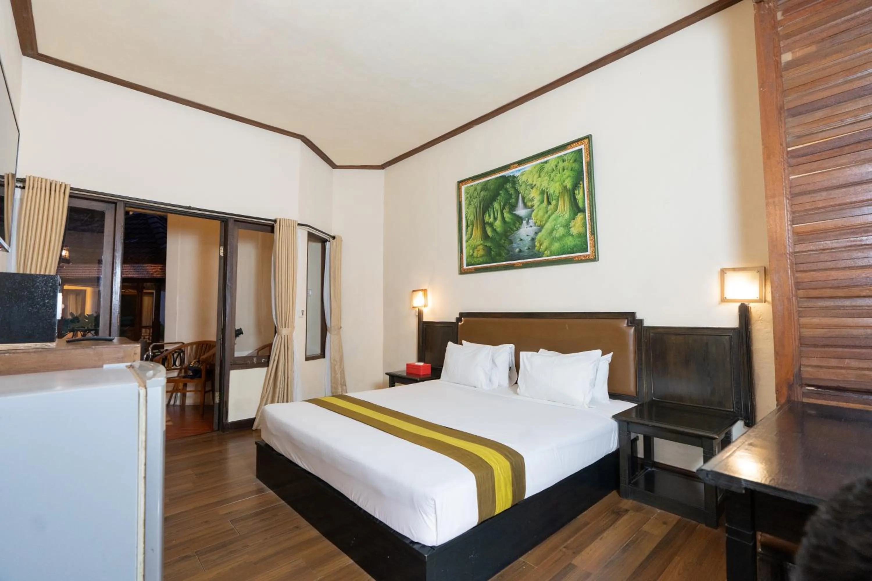 Bed in The Flora Kuta Bali