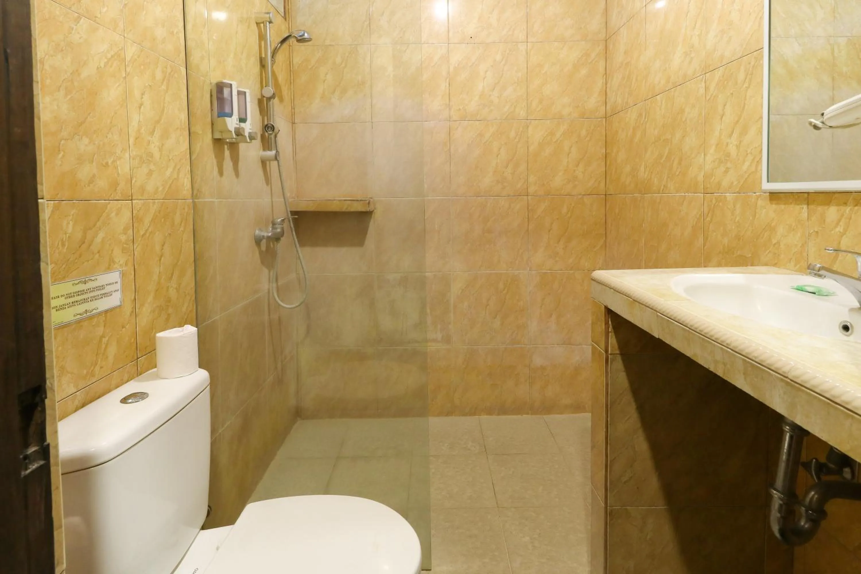 Bathroom in The Flora Kuta Bali