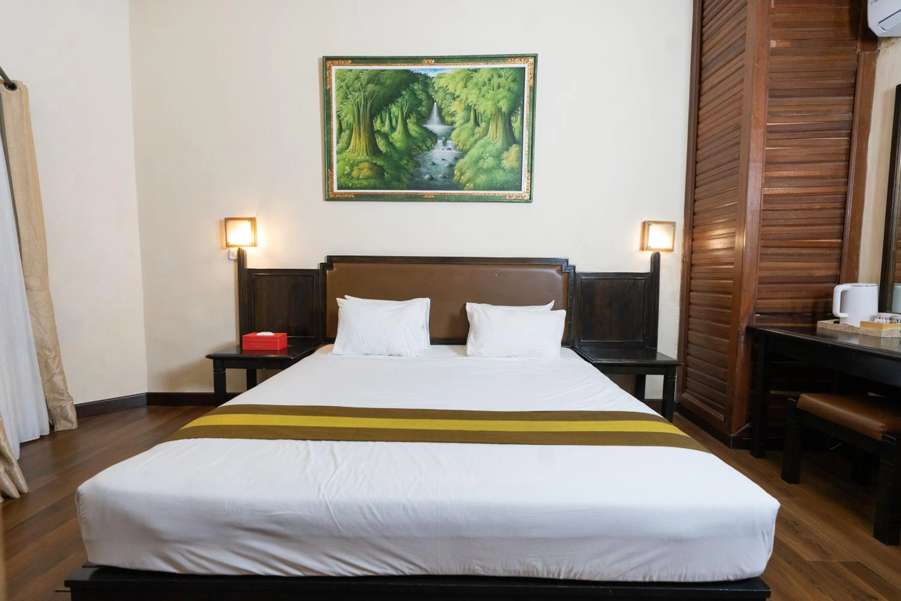 Bed in The Flora Kuta Bali