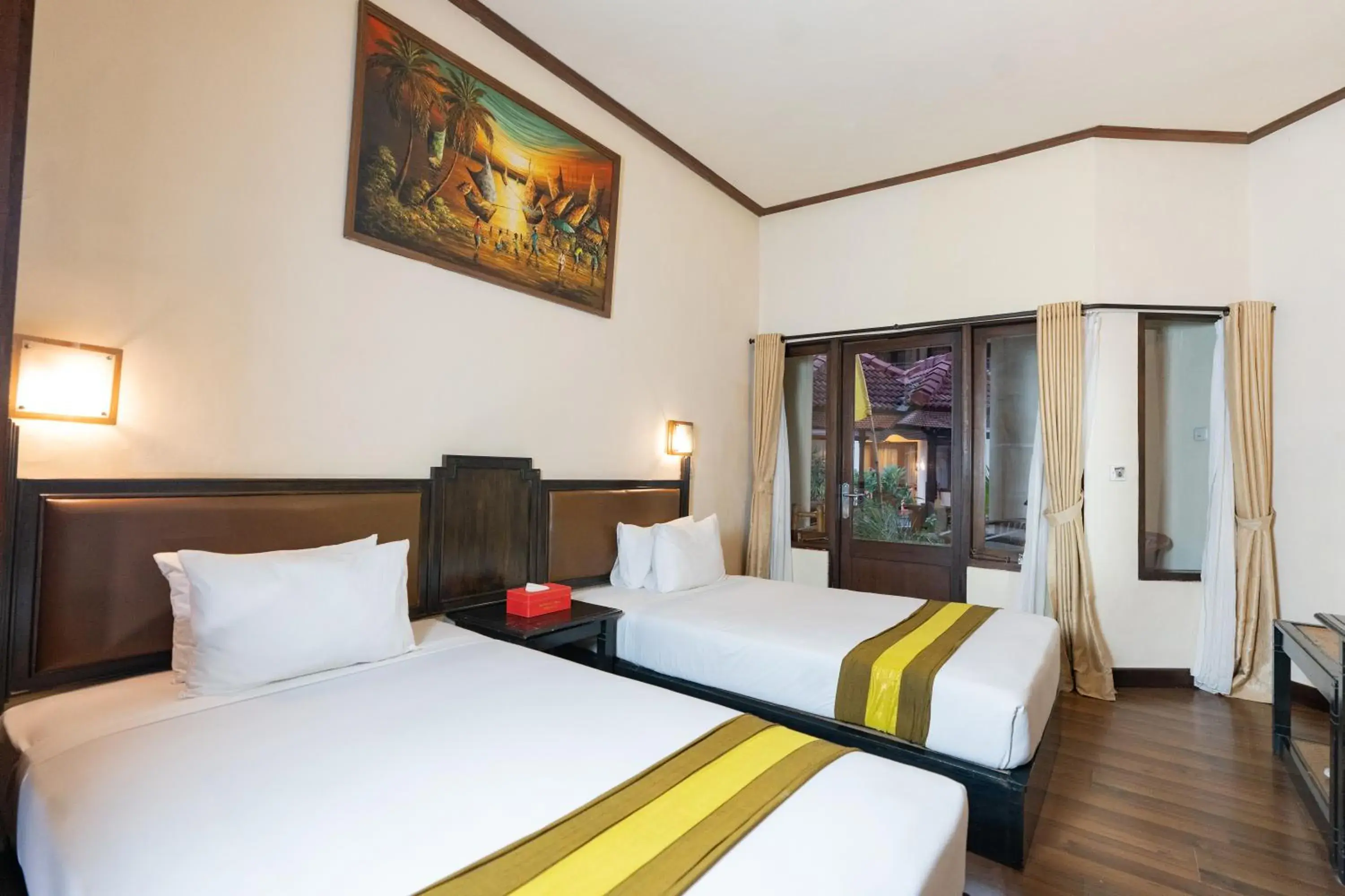 Bed in The Flora Kuta Bali Bed in The Flora Kuta Bali