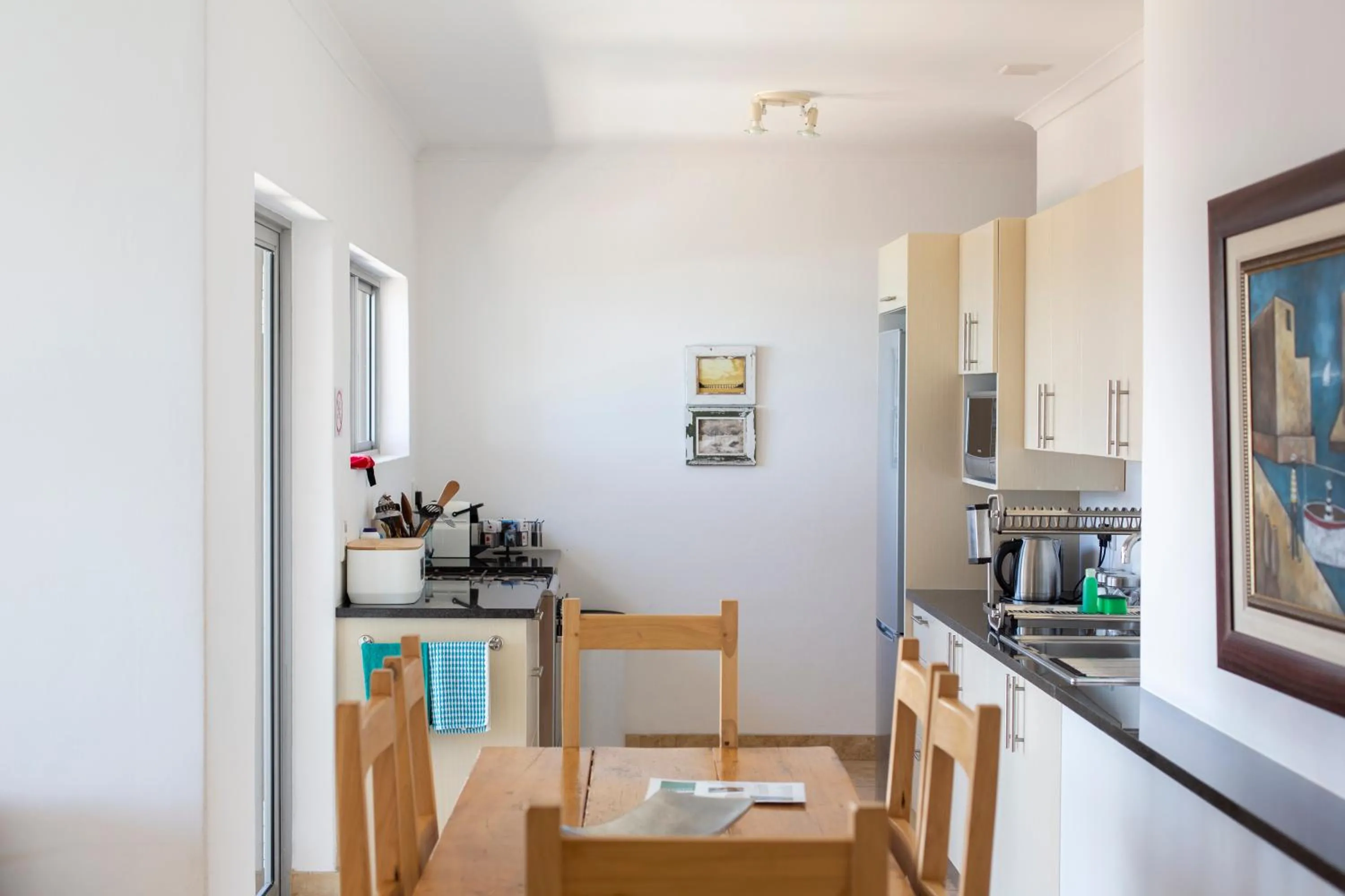 Kitchen or kitchenette in Infinity Blue Luxury Accommodation
