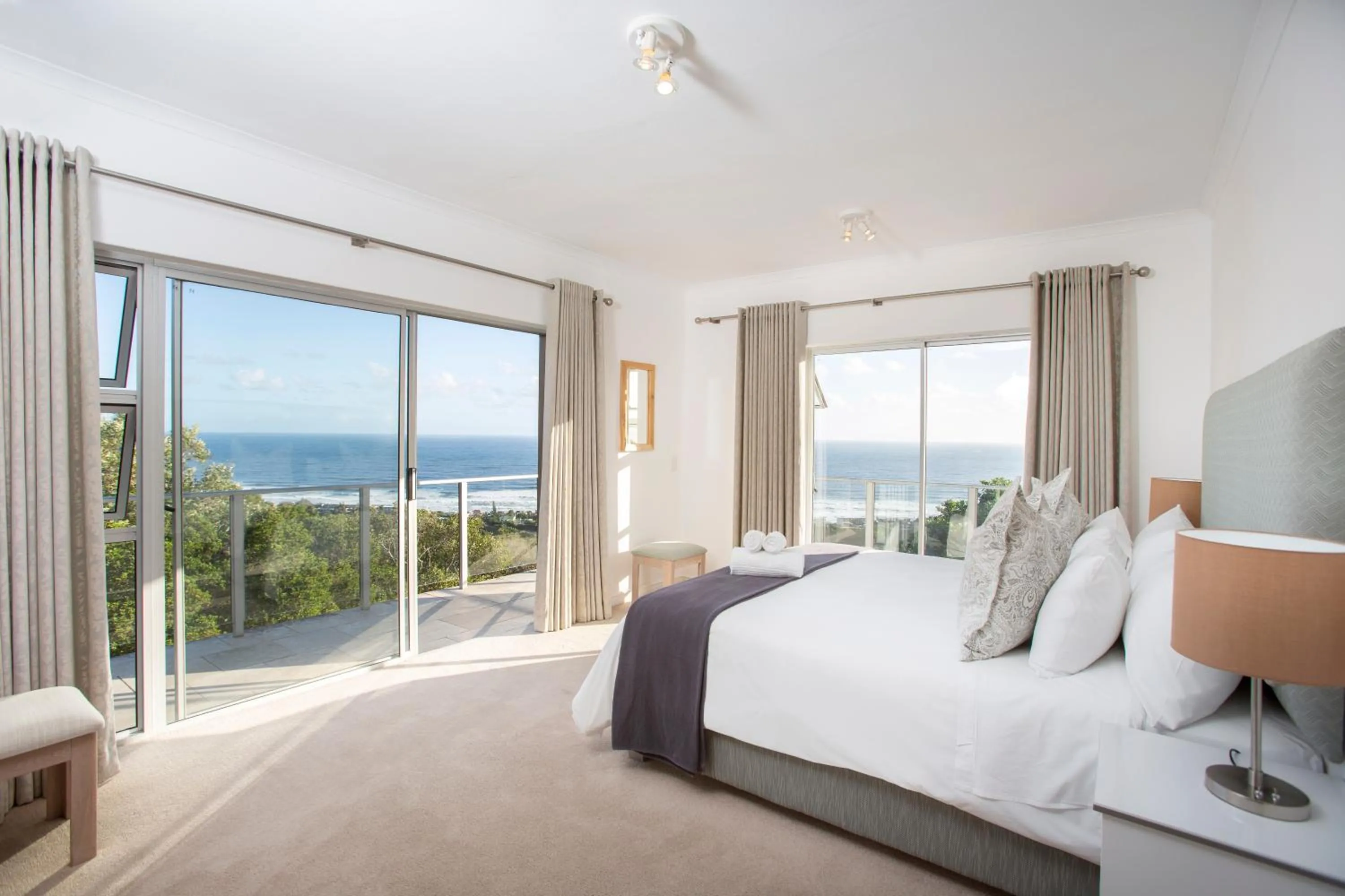 Bed in Infinity Blue Luxury Accommodation