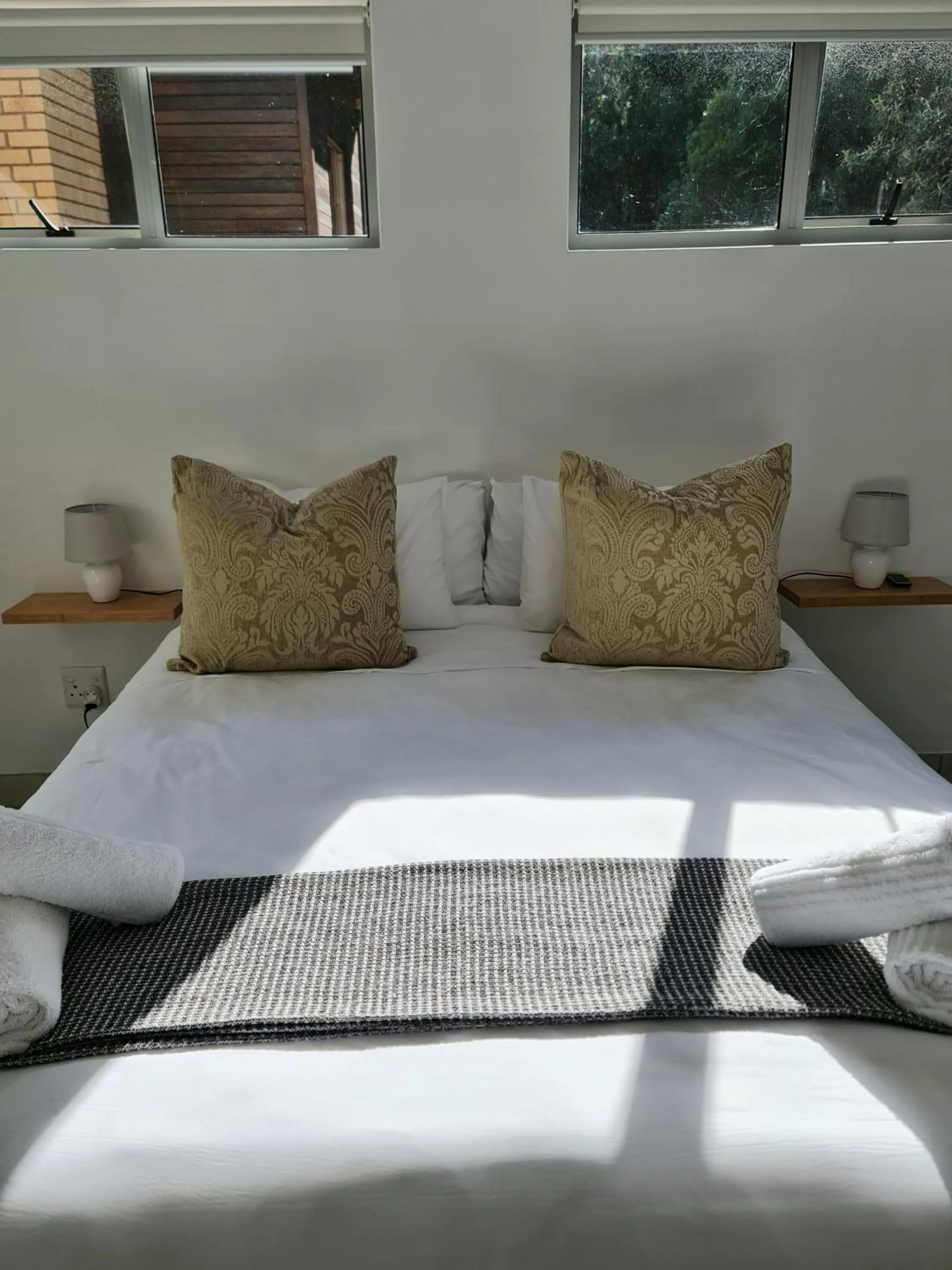 Bed in Infinity Blue Luxury Accommodation