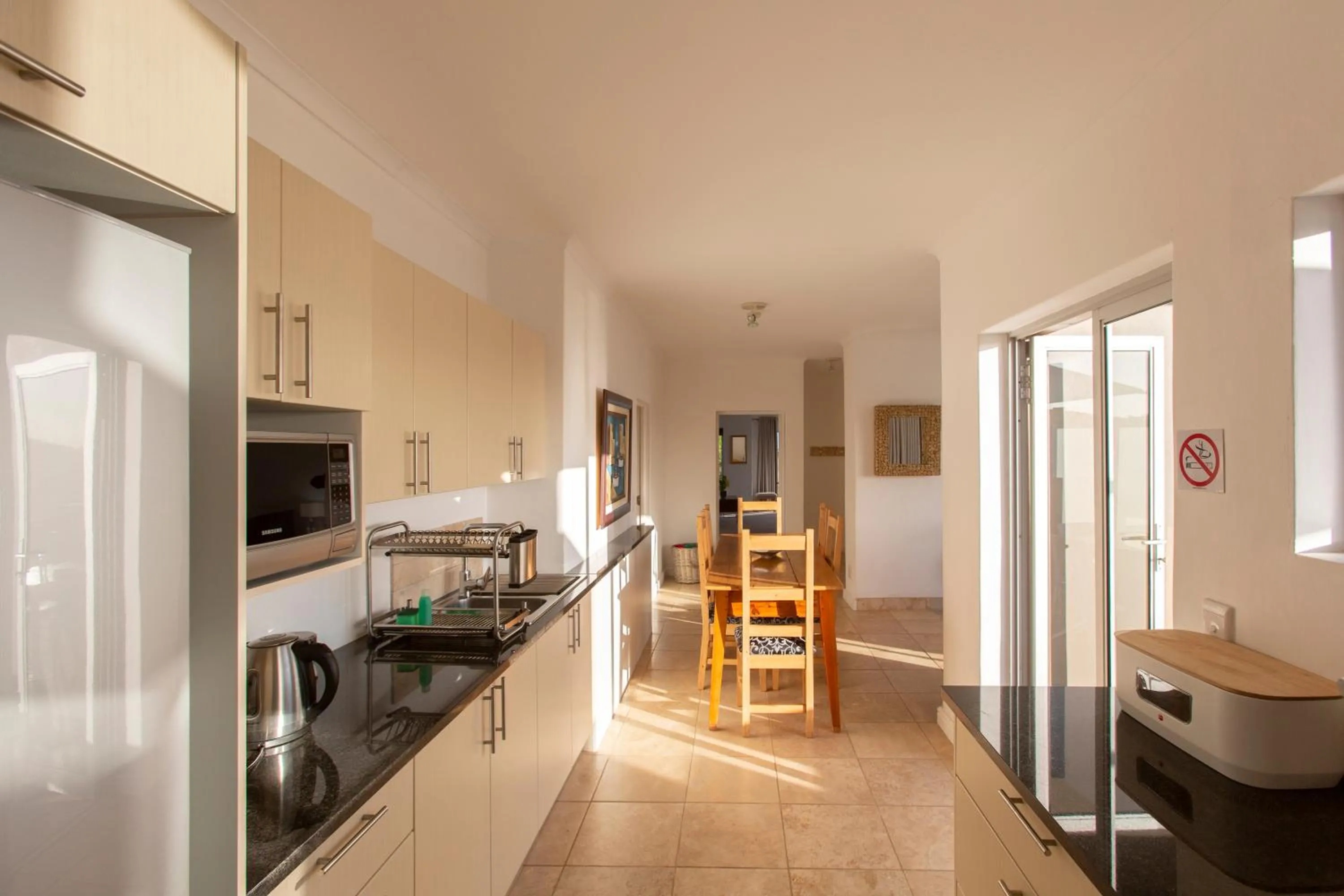 Kitchen or kitchenette in Infinity Blue Luxury Accommodation