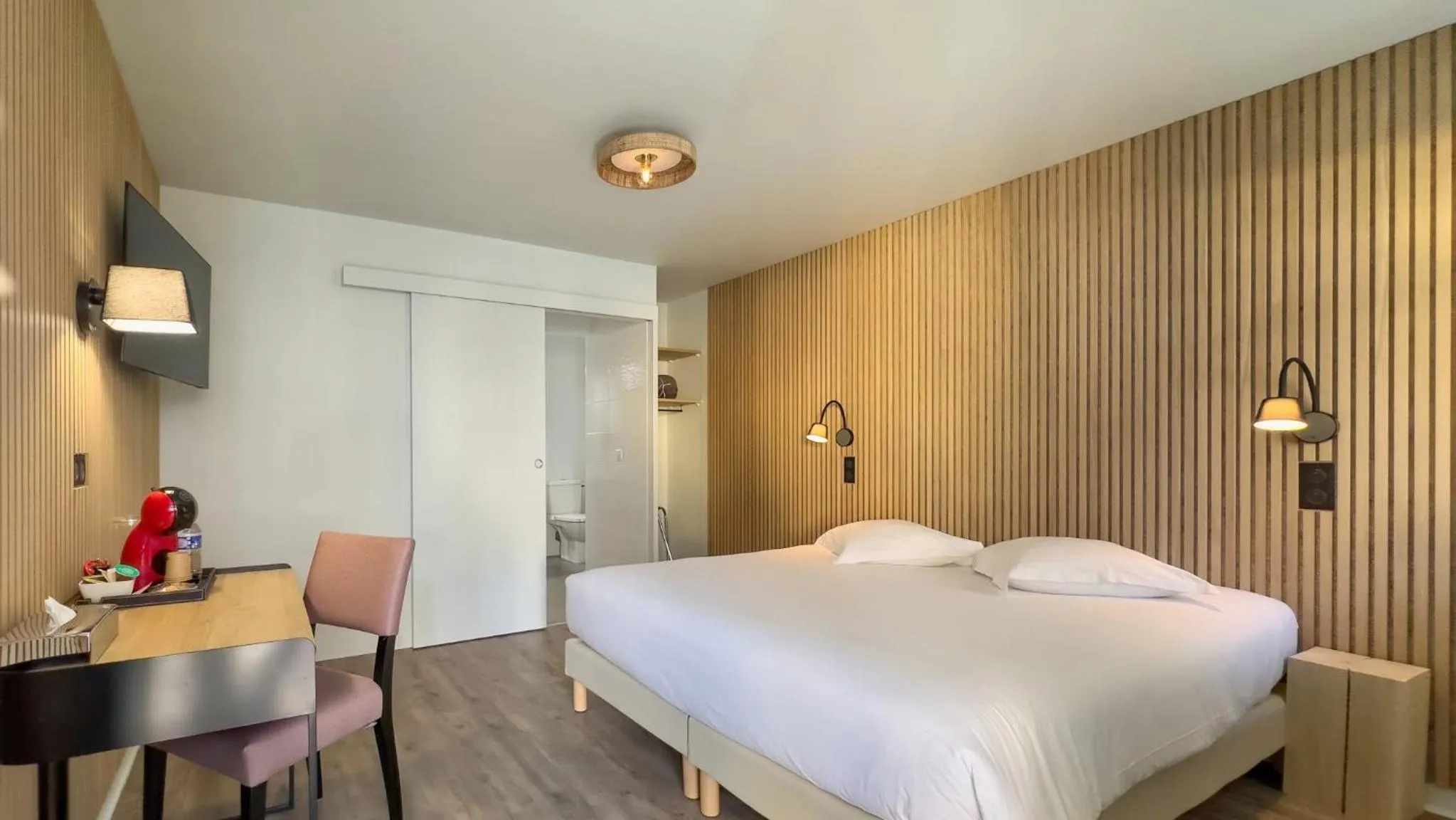 Bed in Hotel De La Gare