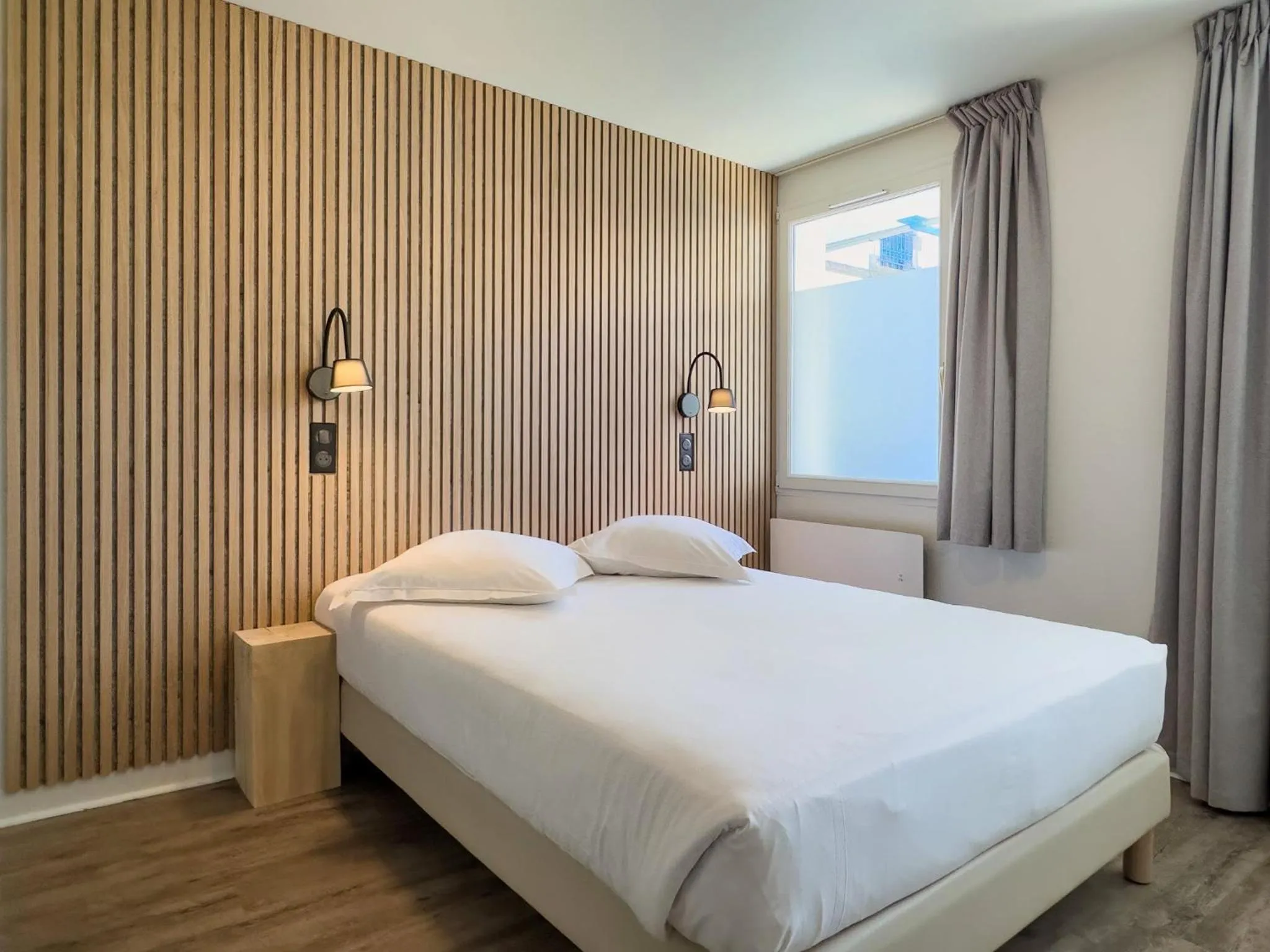 Bed in Hotel De La Gare