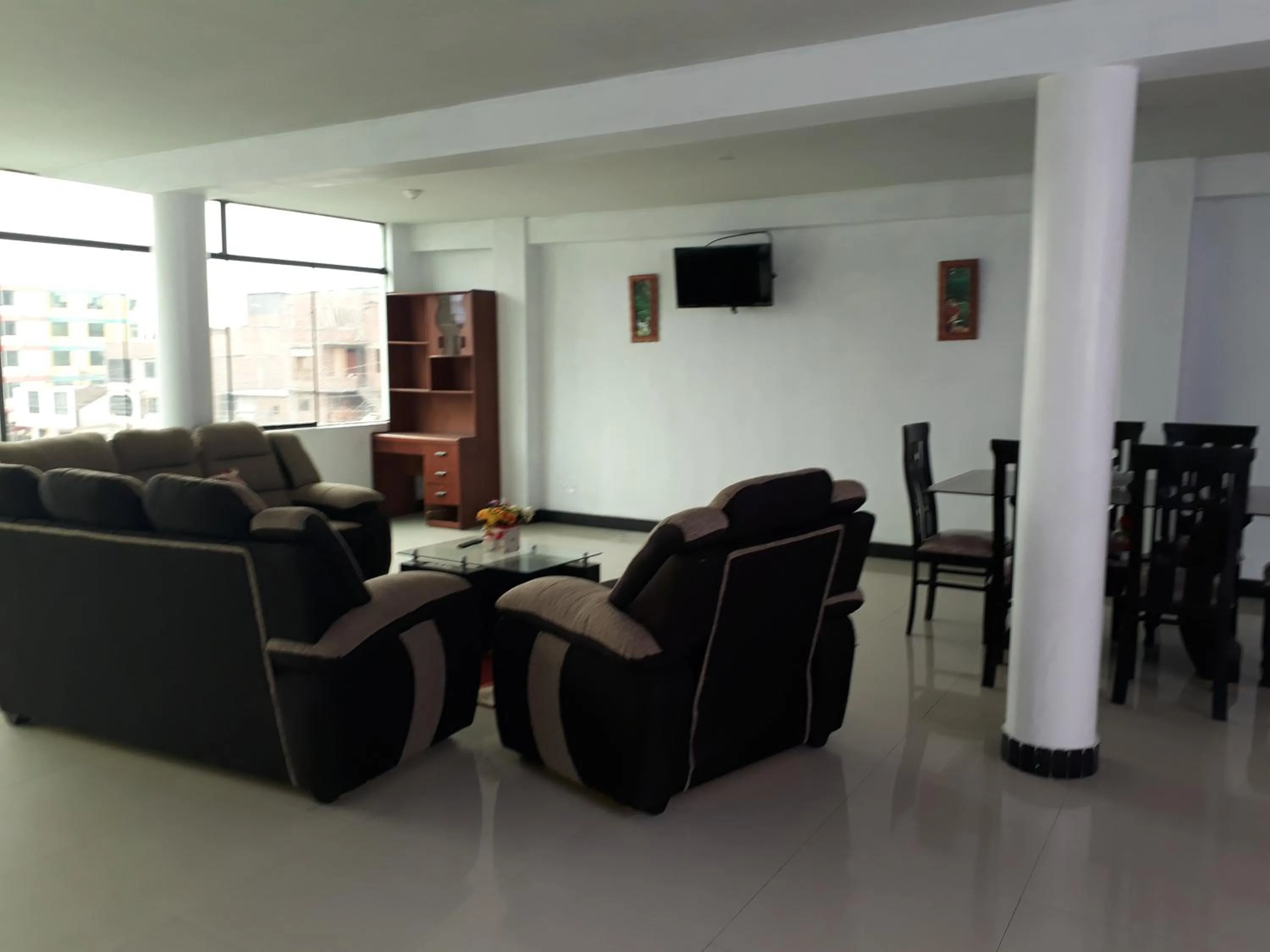 Communal lounge/ TV room in B&B La Casa del Turista