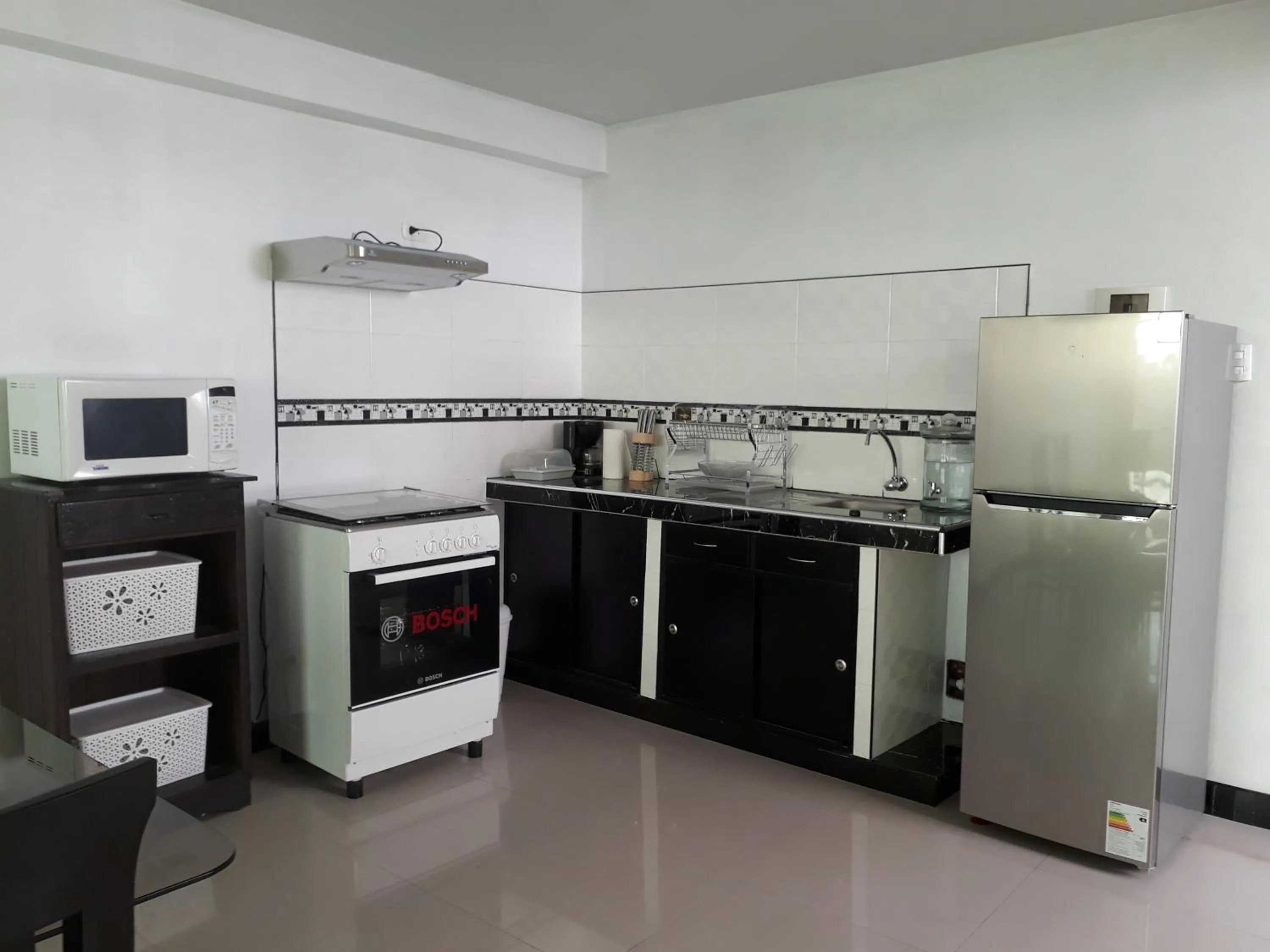 Communal kitchen in B&B La Casa del Turista