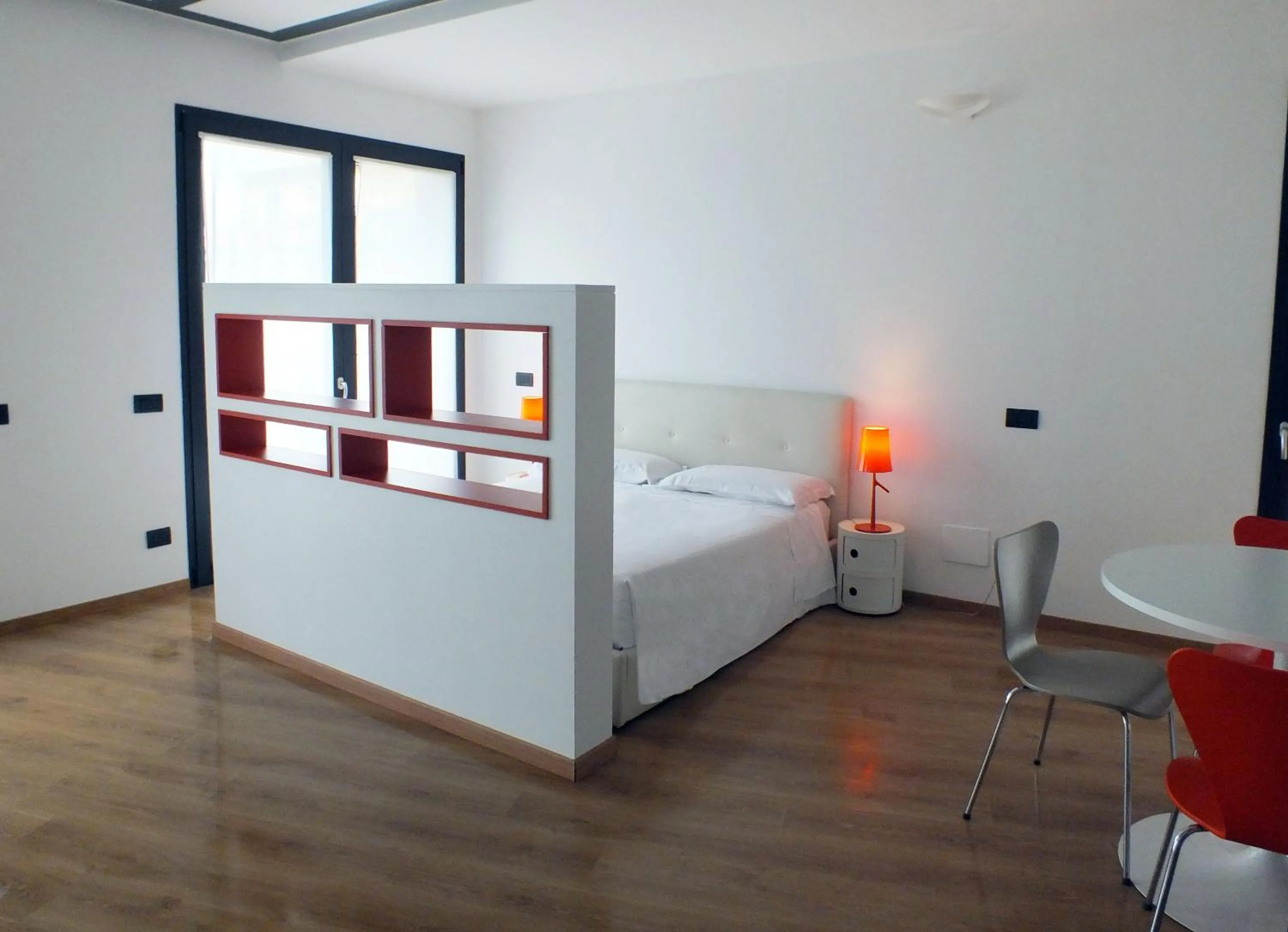 Bed in BB Hotels Aparthotel Isola