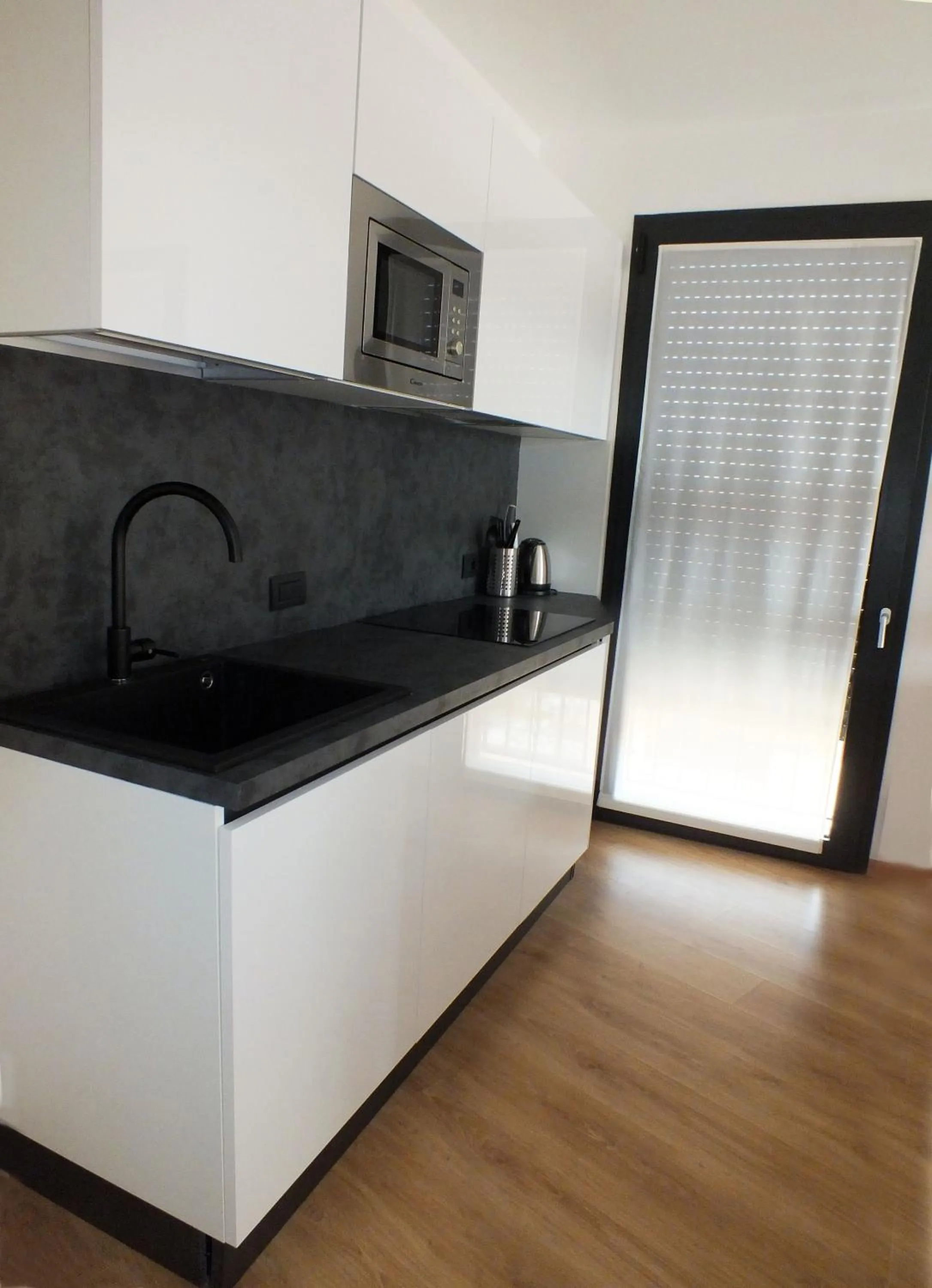 Kitchen or kitchenette in BB Hotels Aparthotel Isola