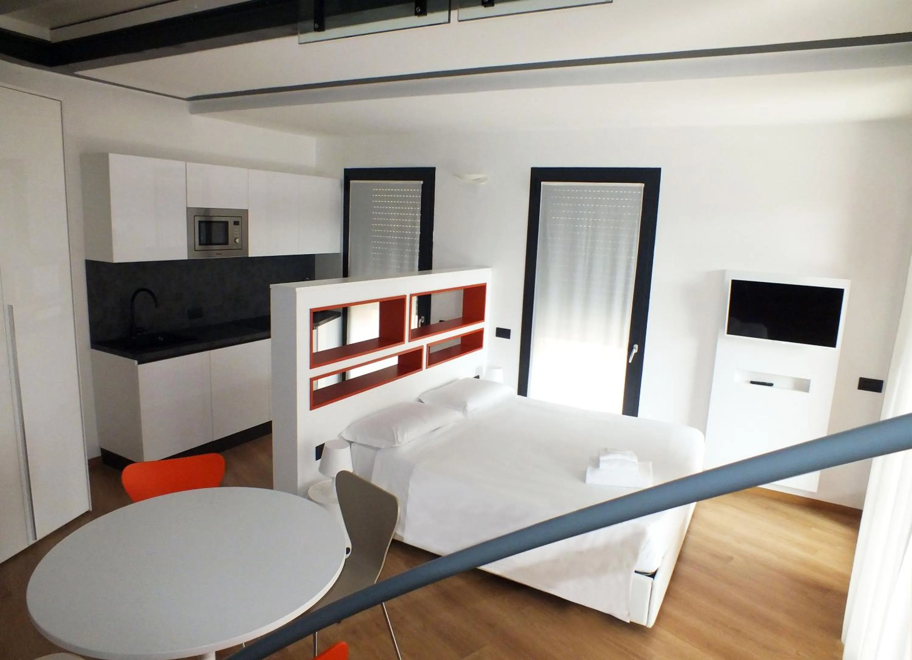 Bed in BB Hotels Aparthotel Isola