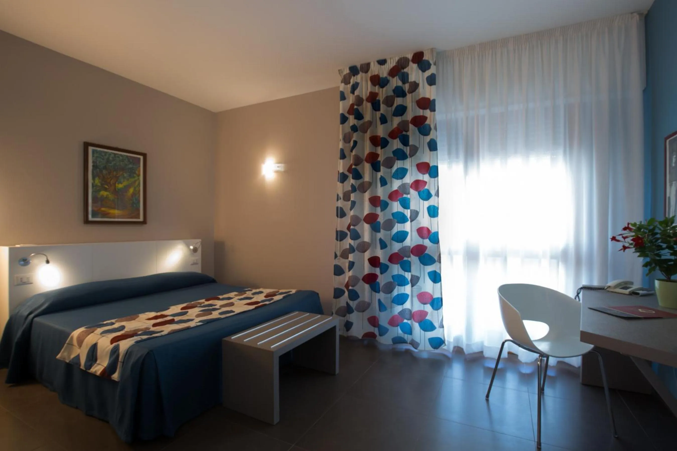 Bed in Marbela Apartments & Suites