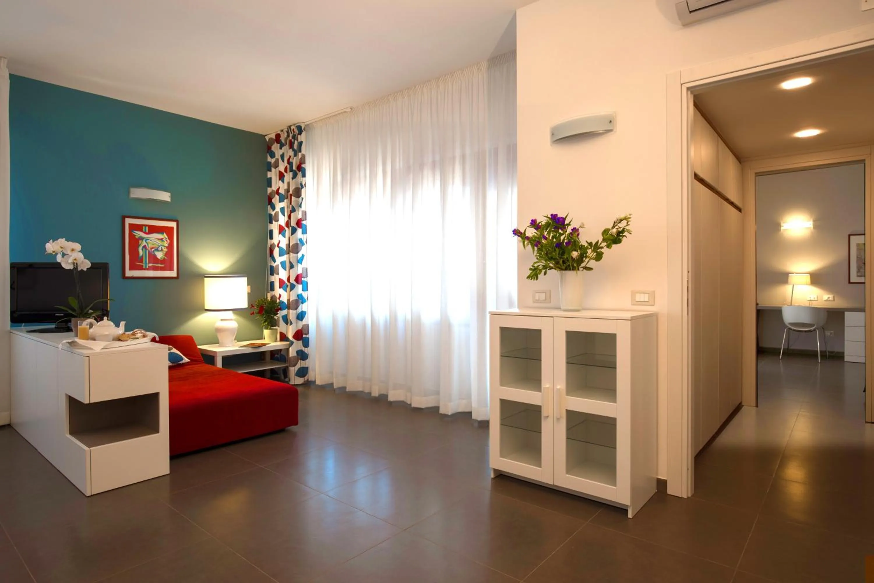 Bed in Marbela Apartments & Suites