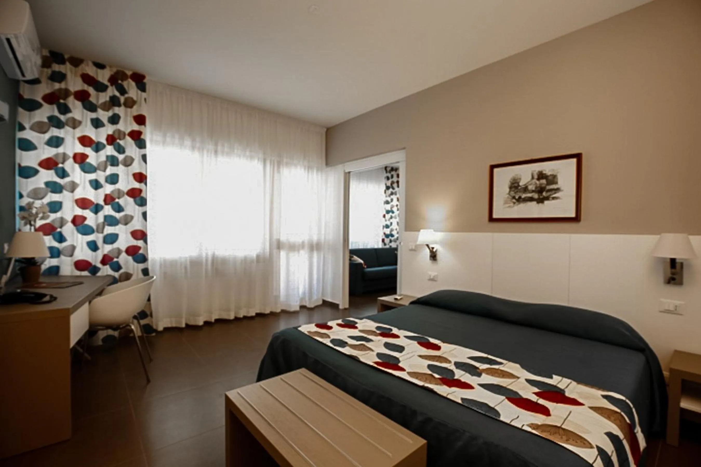 Bed in Marbela Apartments & Suites