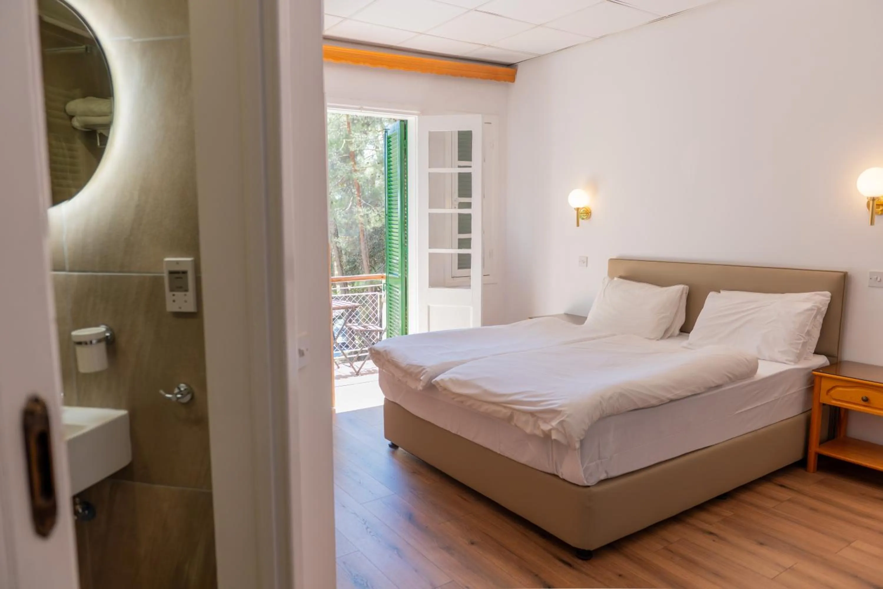 Bed in New Helvetia Historic Hotel