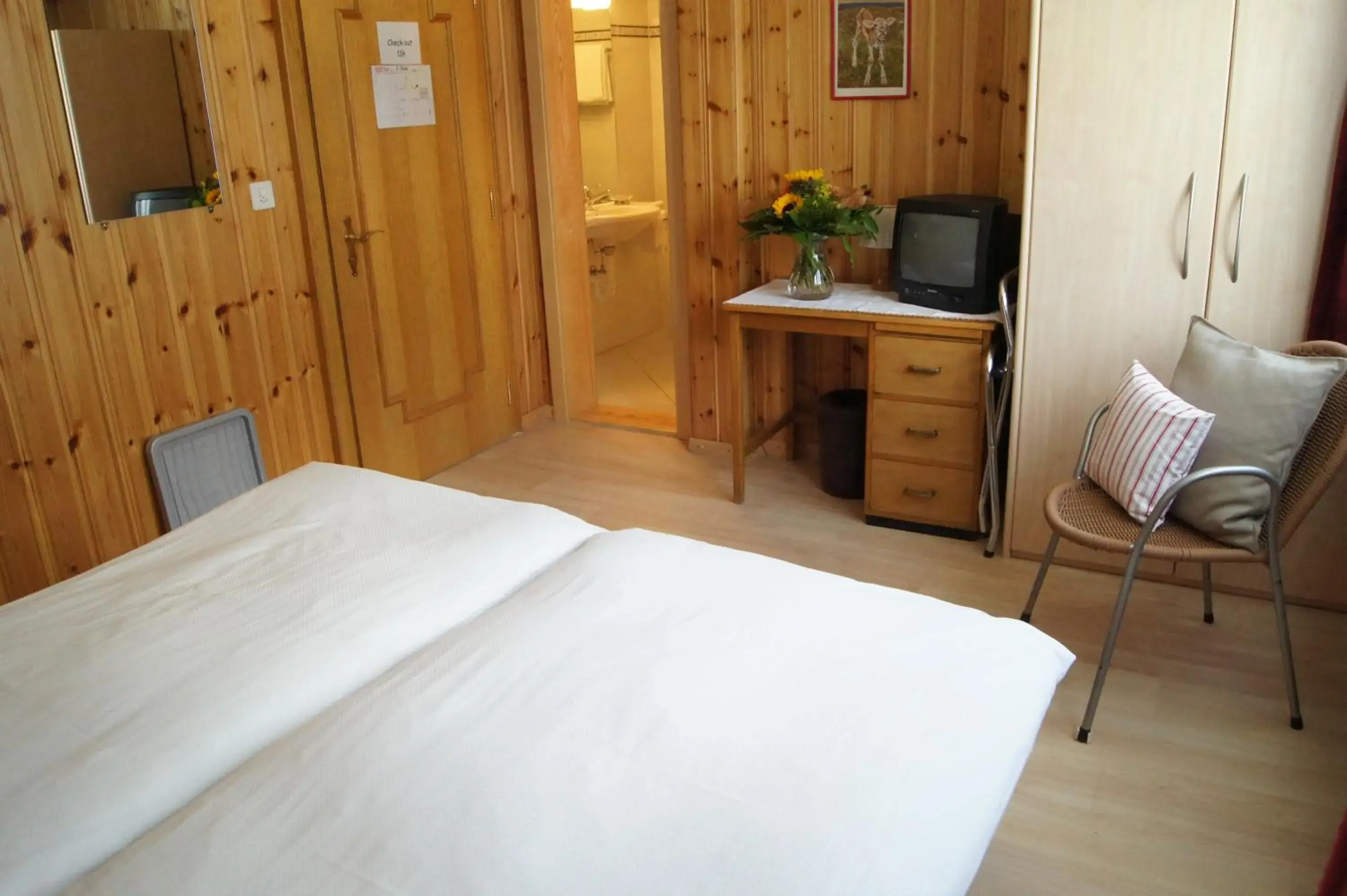 Bed in Hotel Alpina Bed in Hotel Alpina