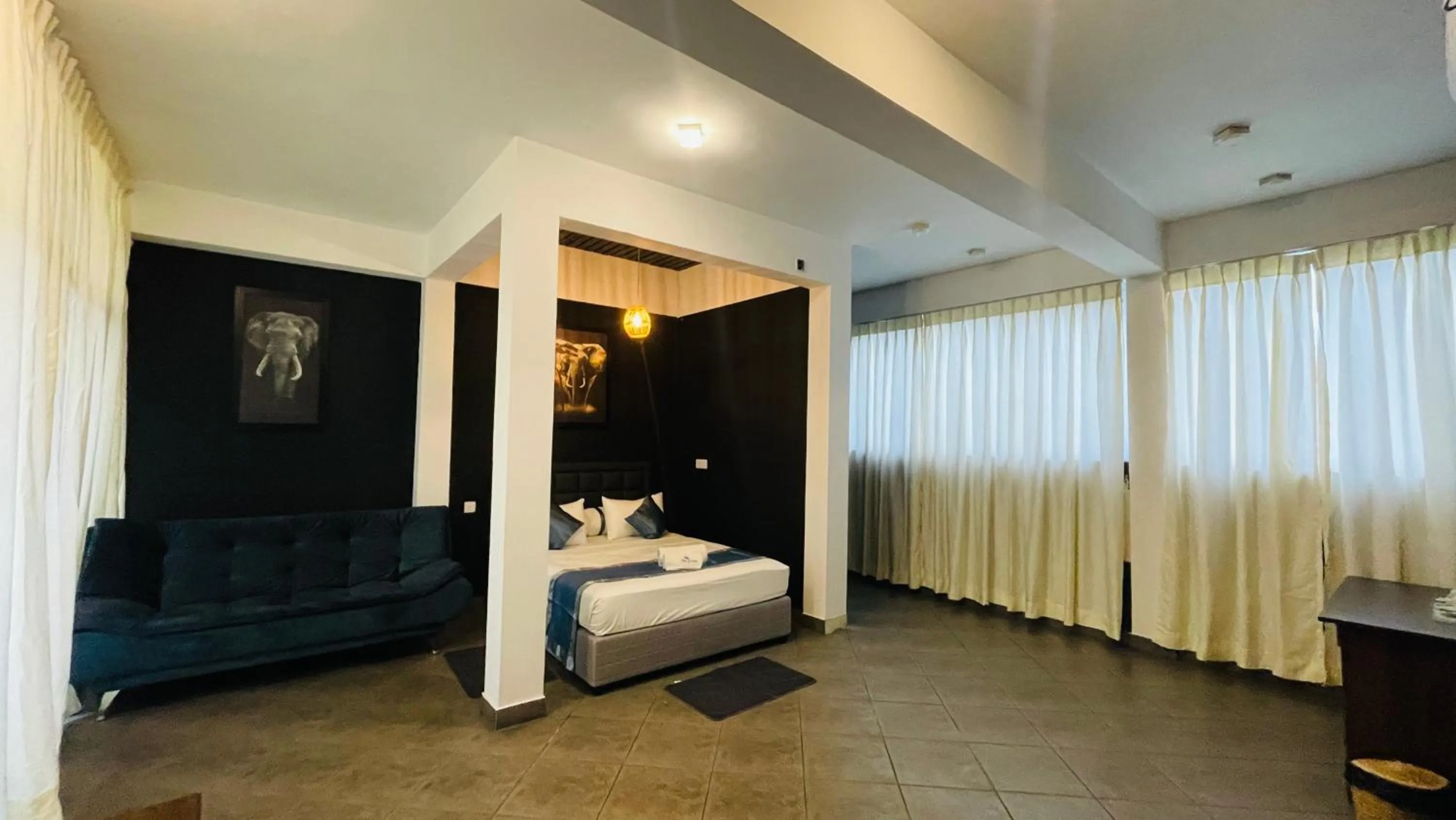 Bed in Blue Whale Resort & Kite Surfing