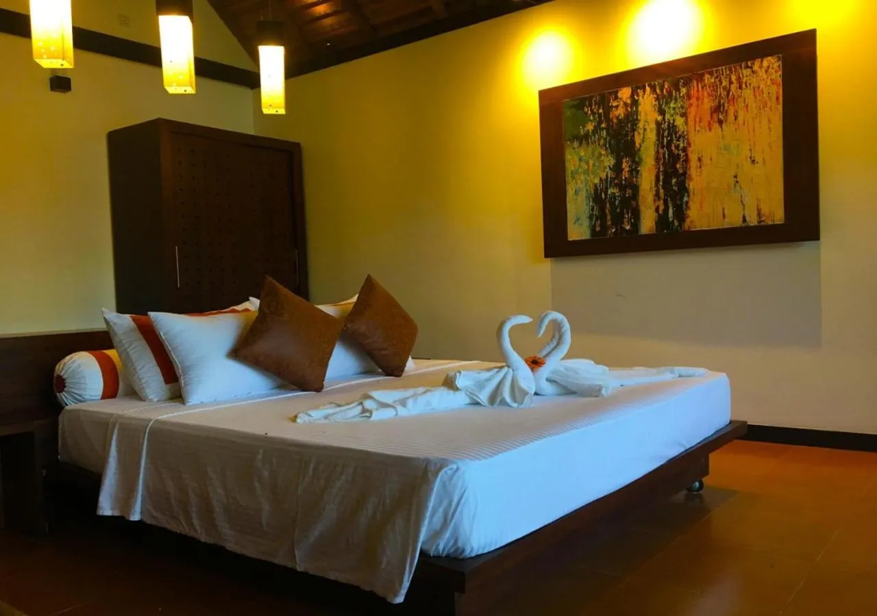 Bed in Blue Whale Resort & Kite Surfing