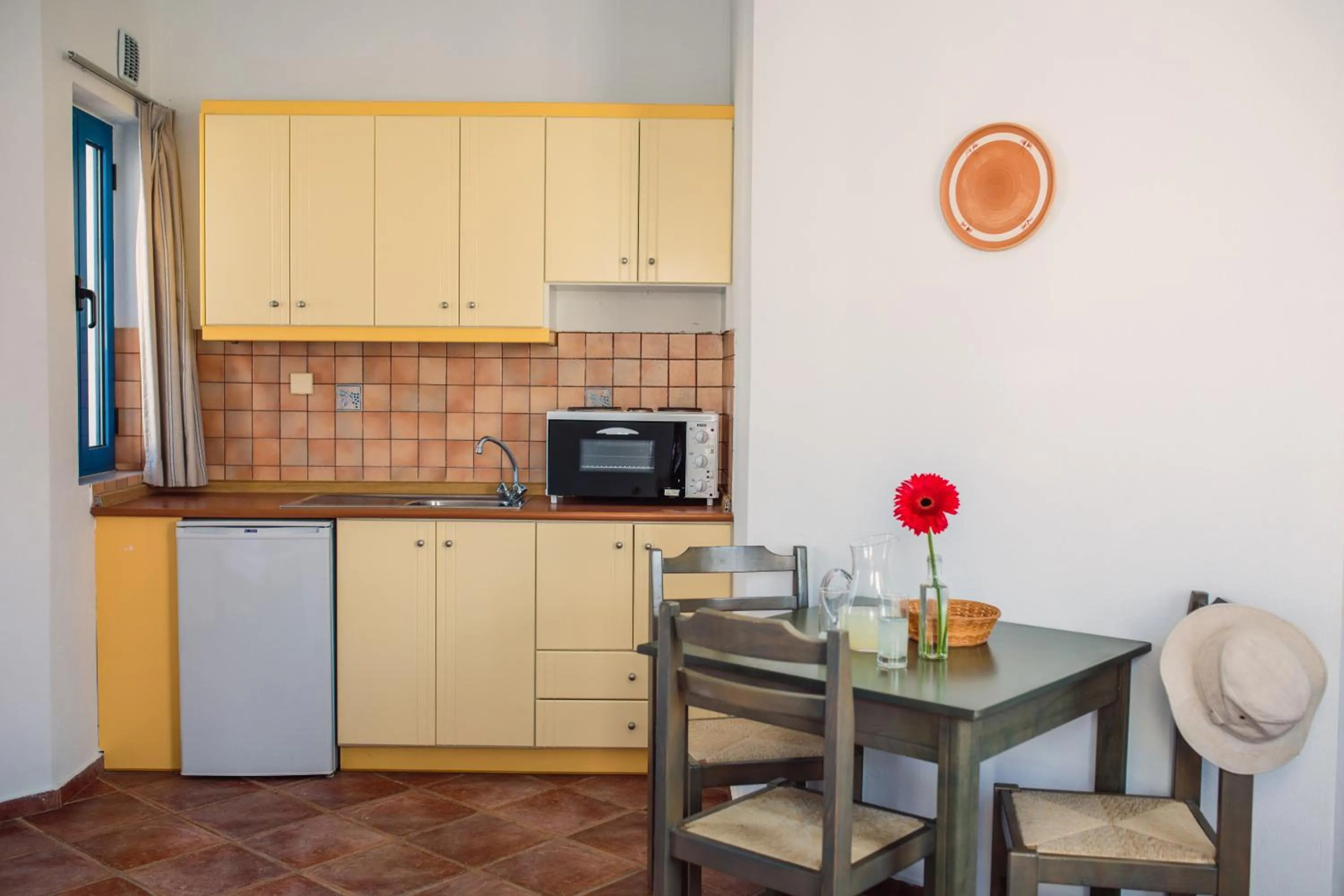 Kitchen or kitchenette in Iliana Hotel