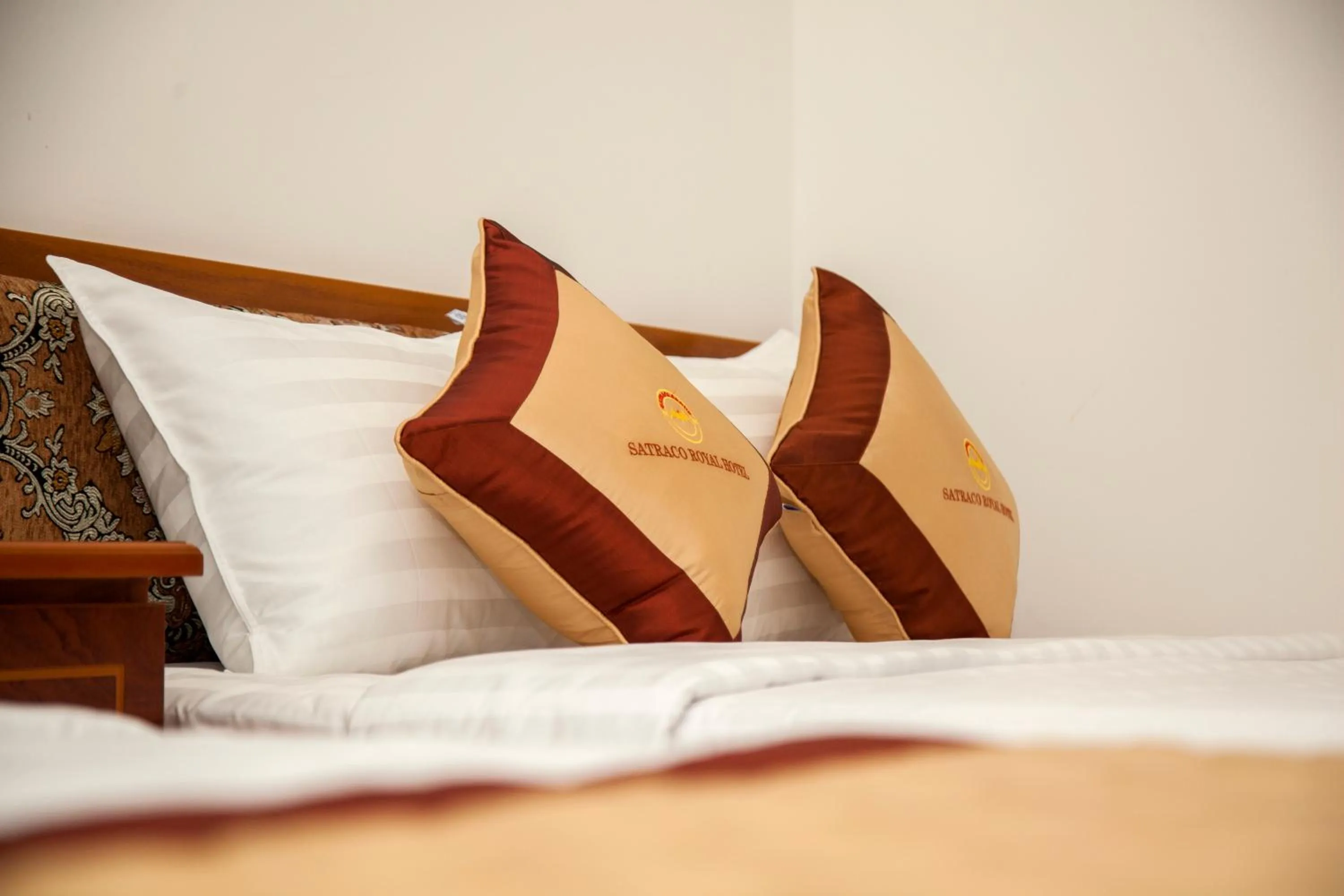 Bed in Satraco Royal Hotel