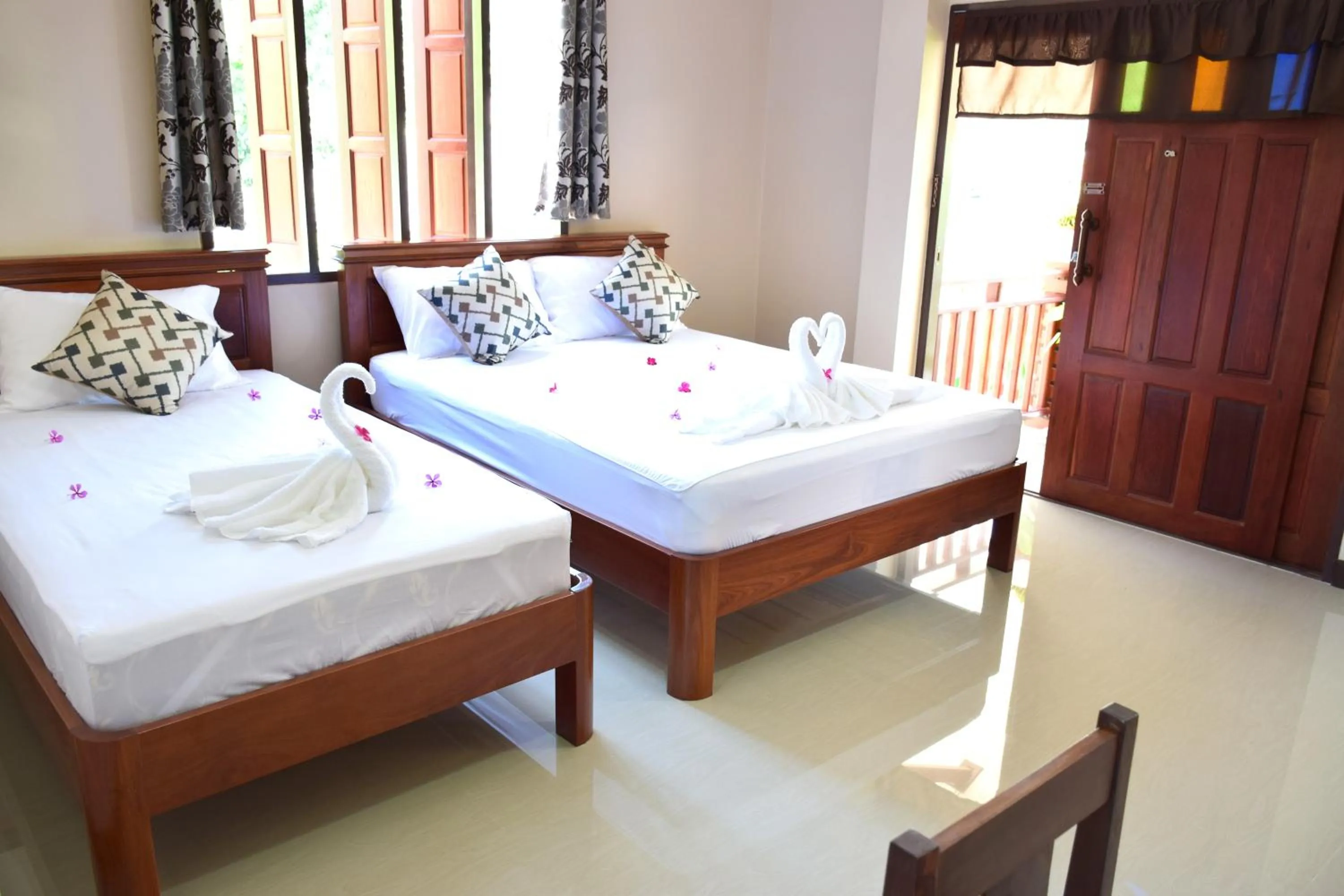 Bed in Siam Guesthouse