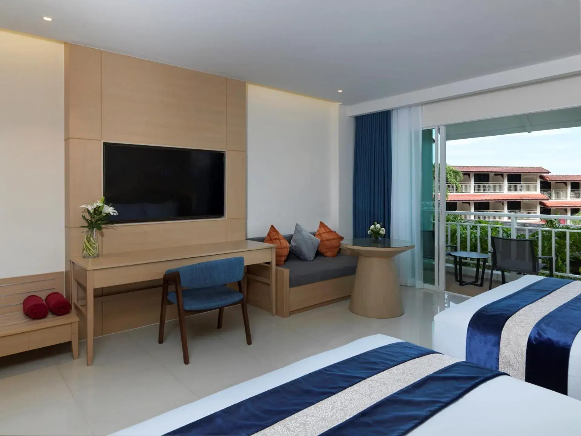 Seating area, Bed in Chanalai Flora Resort, Kata Beach Seating area, Bed in Chanalai Flora Resort, Kata Beach