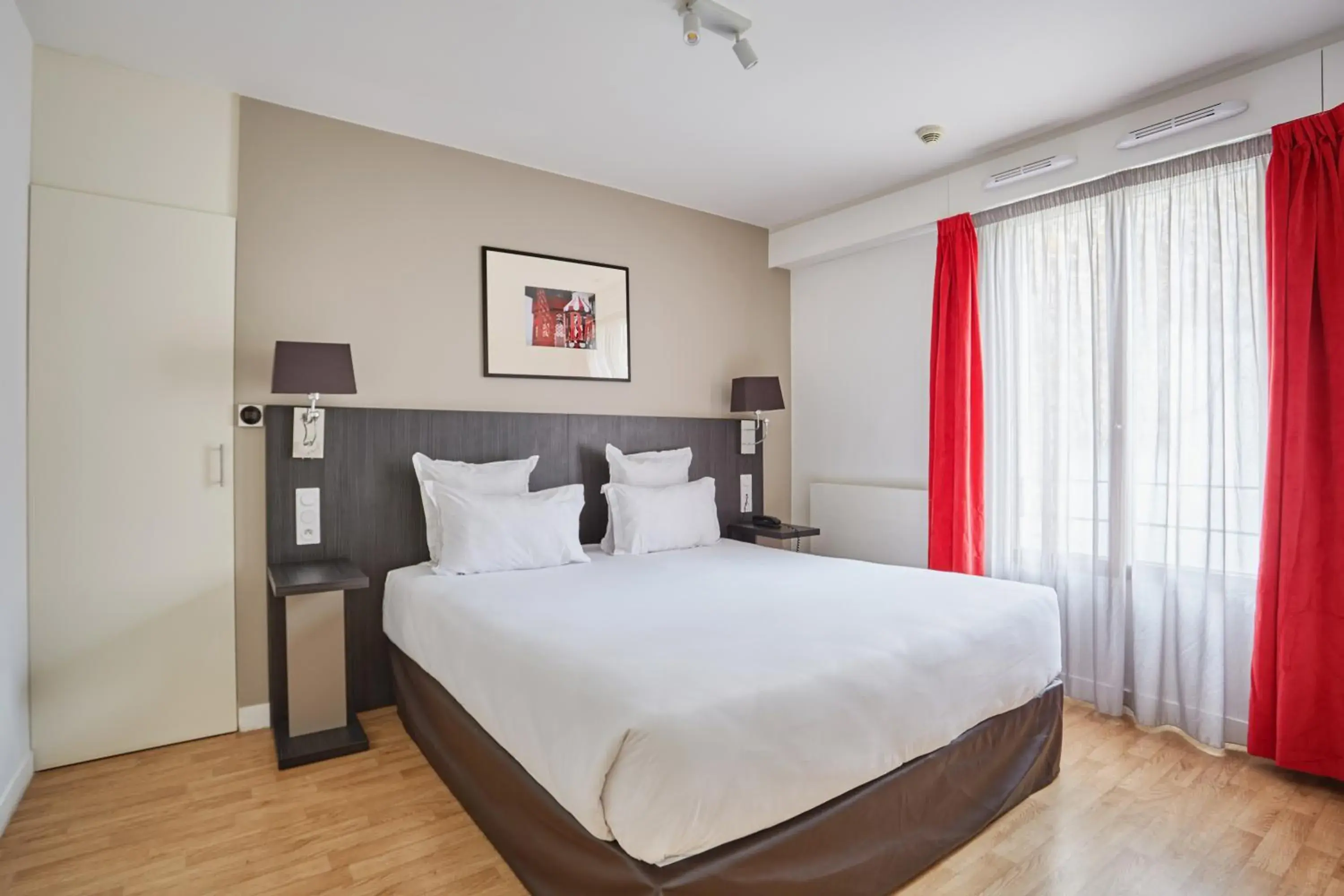 Bedroom, Bed in Appart Hotel Odalys City Paris Montmartre Bedroom, Bed in Appart Hotel Odalys City Paris Montmartre