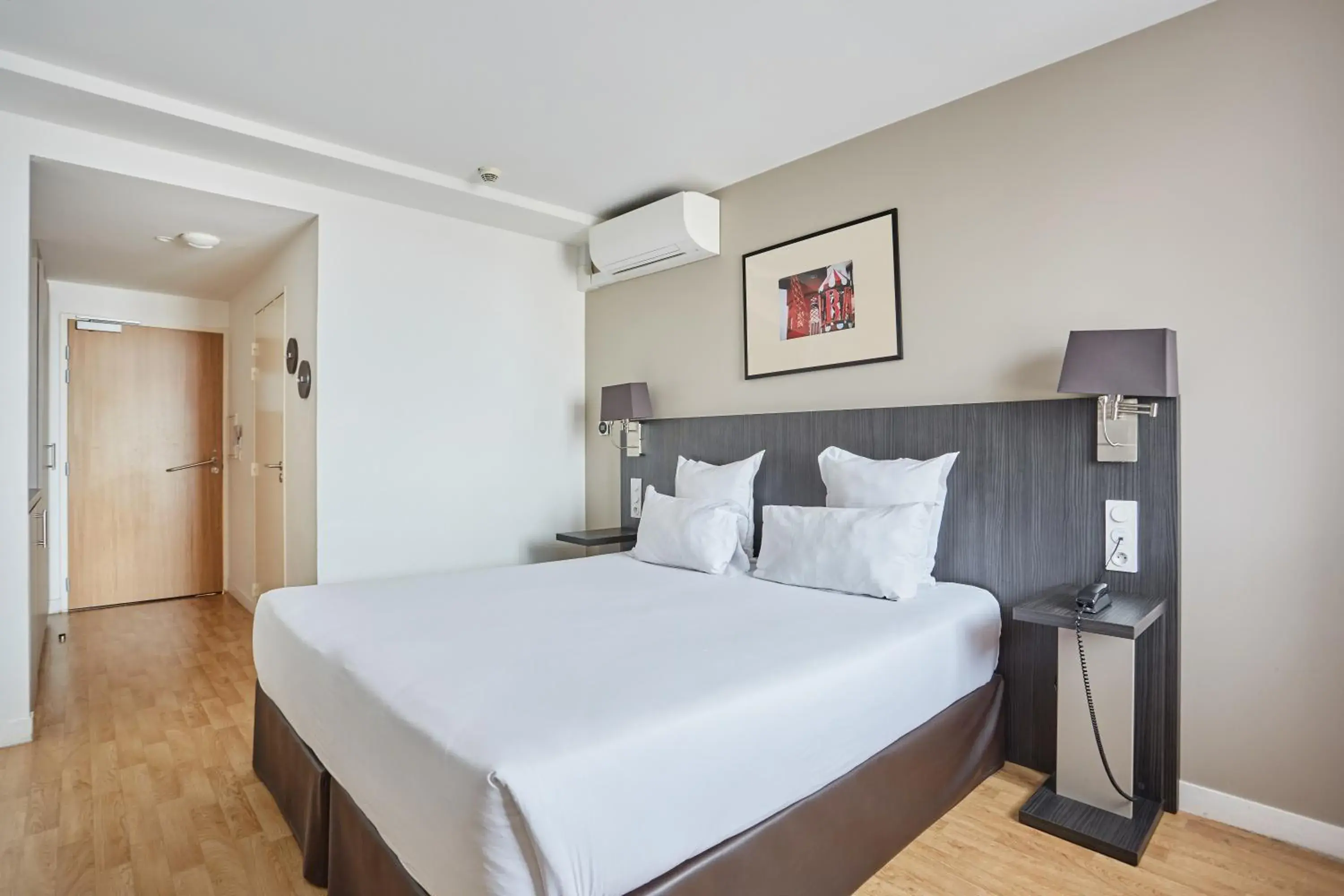 Bedroom, Bed in Appart Hotel Odalys City Paris Montmartre Bedroom, Bed in Appart Hotel Odalys City Paris Montmartre