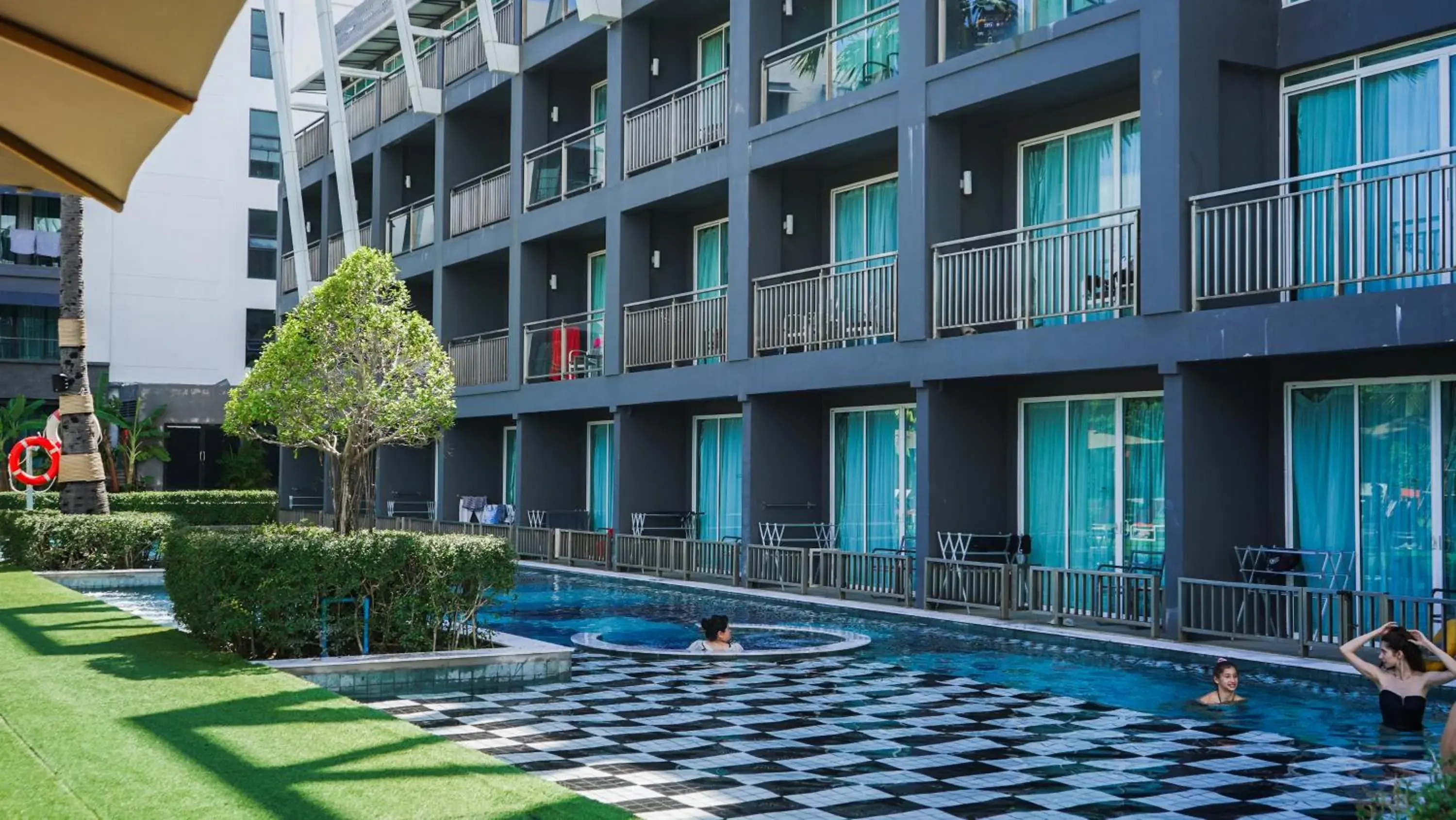 Swimming pool in Sugar Marina Hotel - ART - Karon Beach Swimming pool in Sugar Marina Hotel - ART - Karon Beach