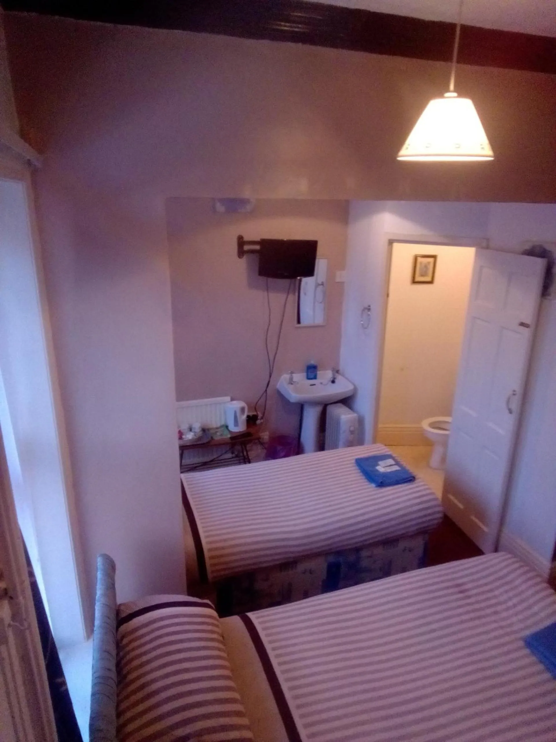 Bed in MyRoomz Golden Strand Hotel