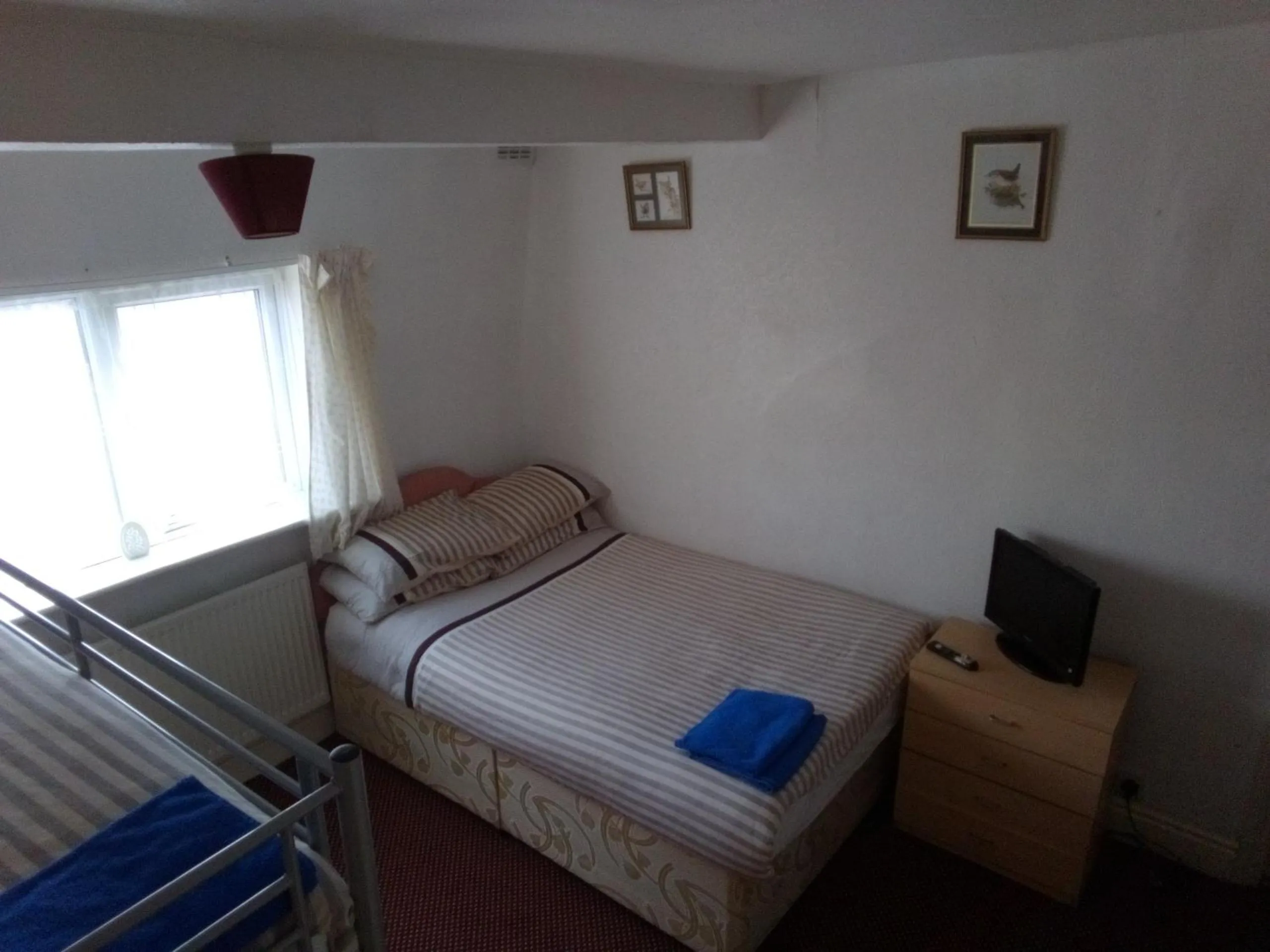 Bed in MyRoomz Golden Strand Hotel