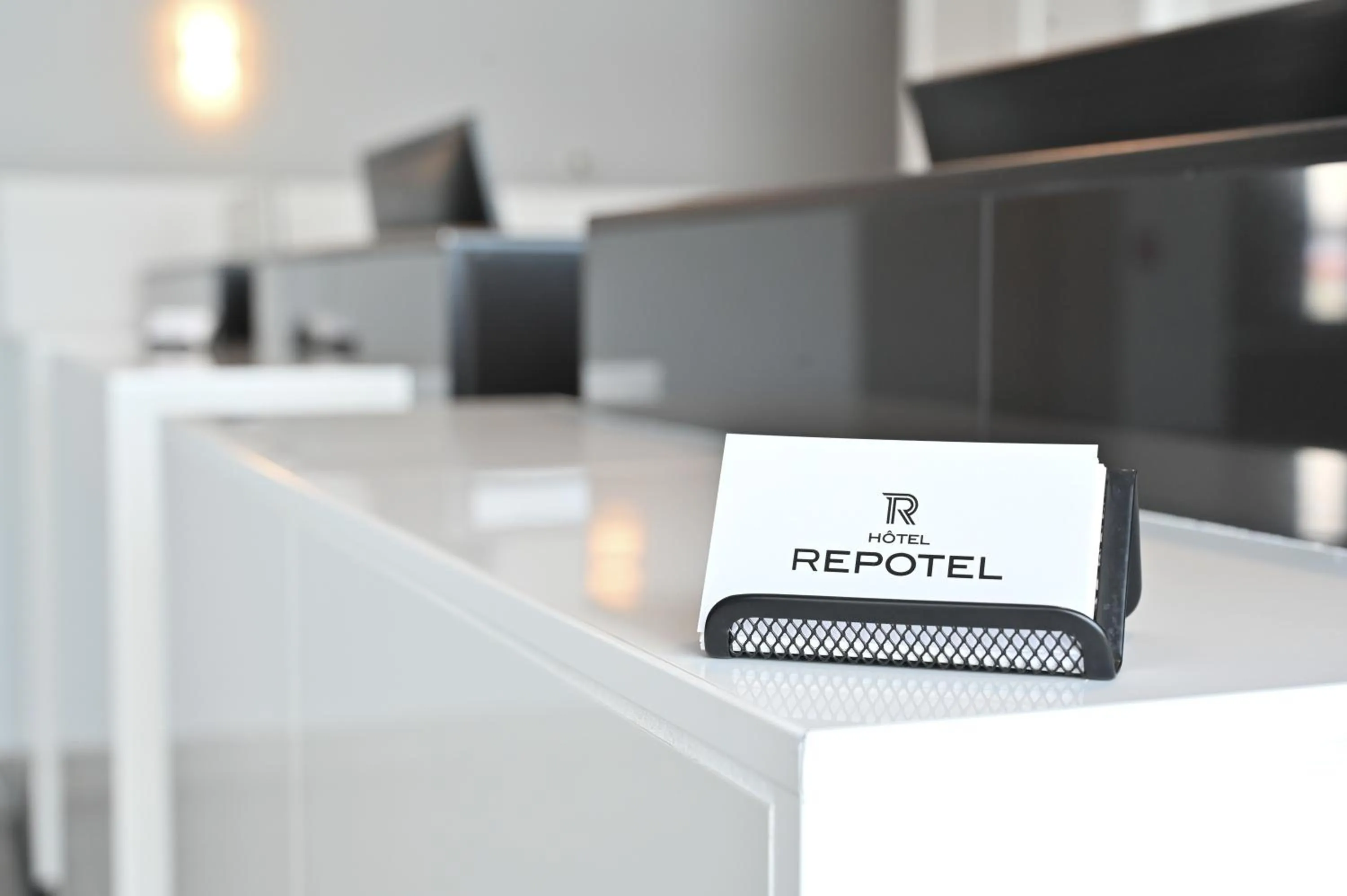 Property logo or sign in Repotel Levis