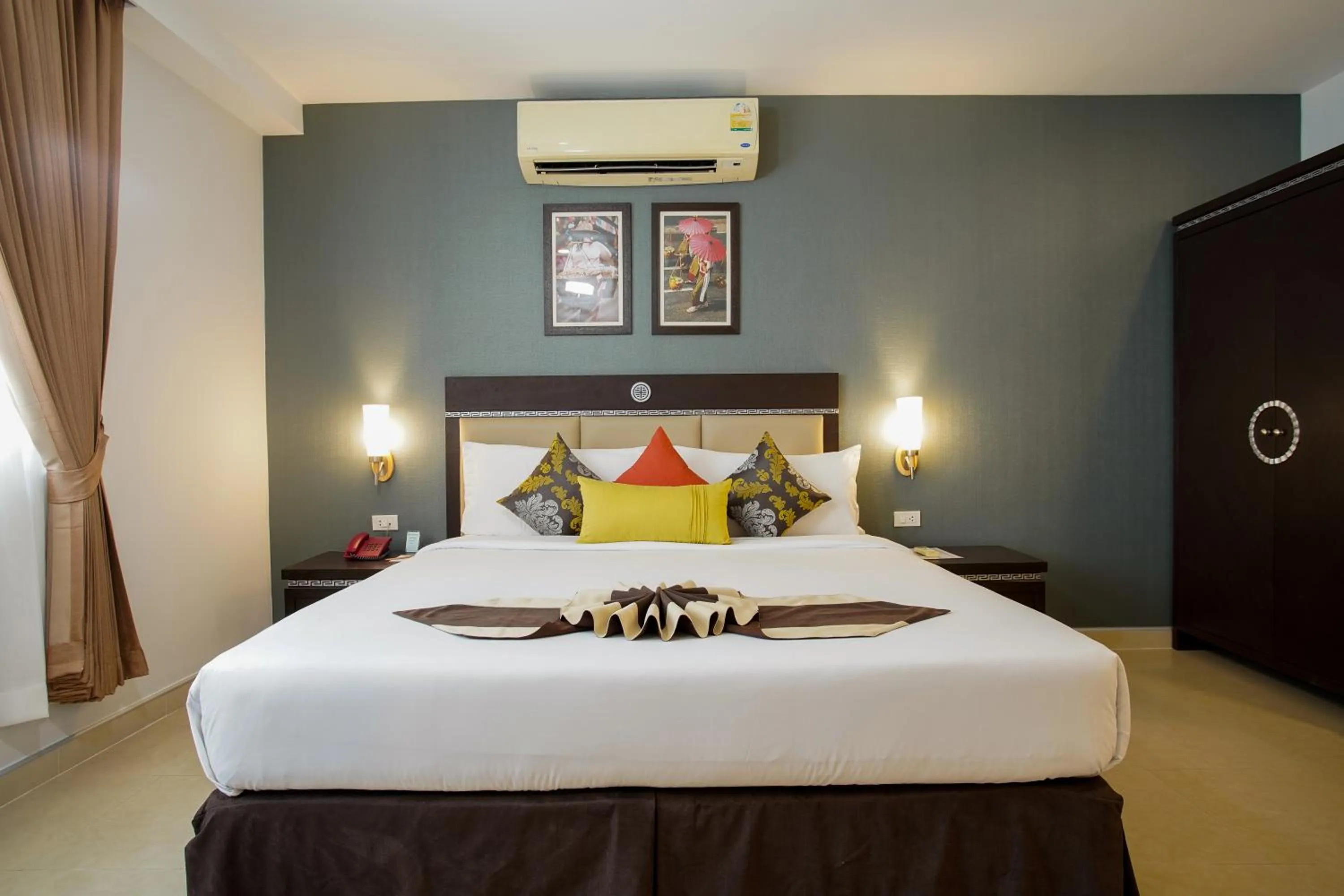 Bed in Club Mahindra Mac Boutique Hotel