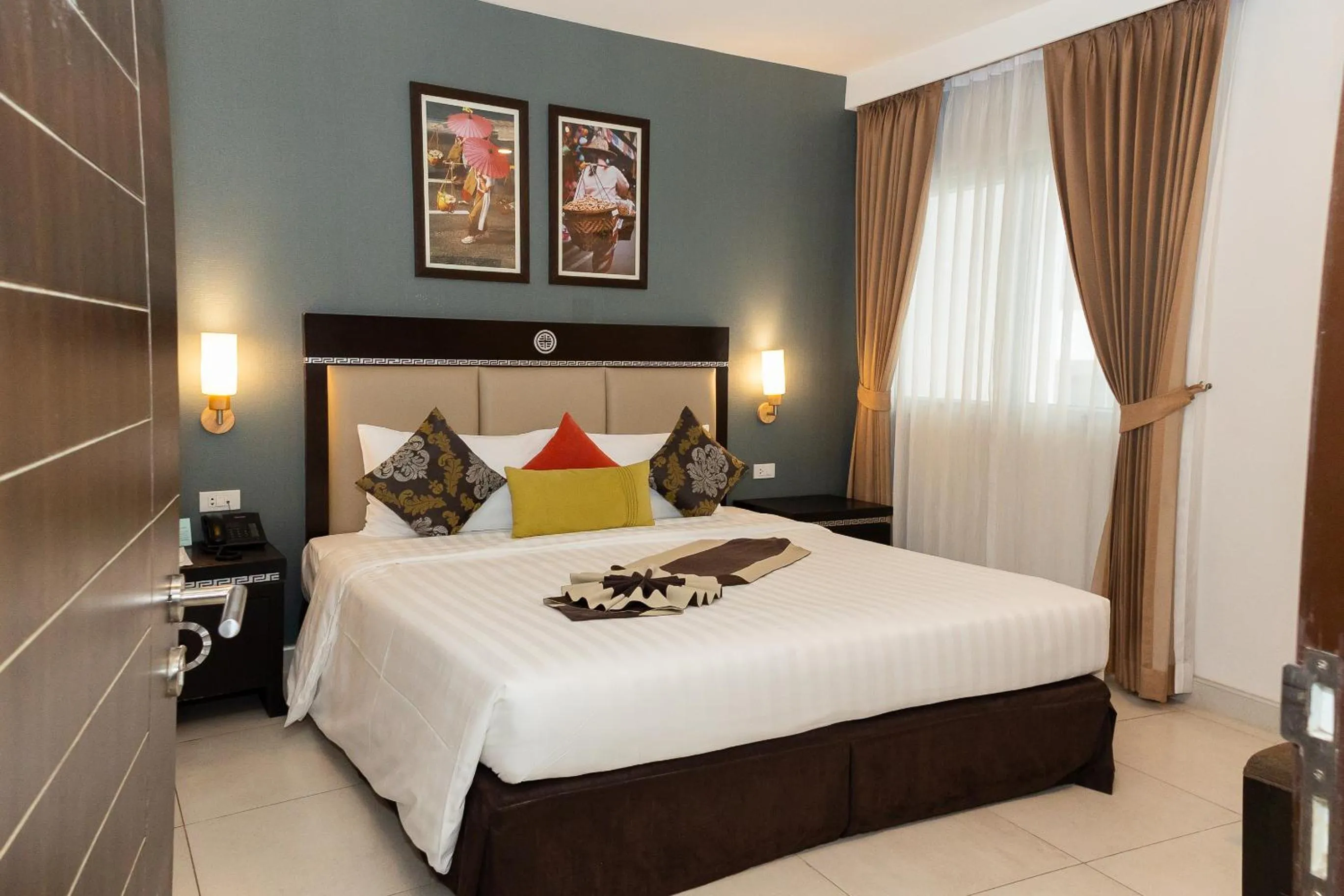 Bed in Club Mahindra Mac Boutique Hotel