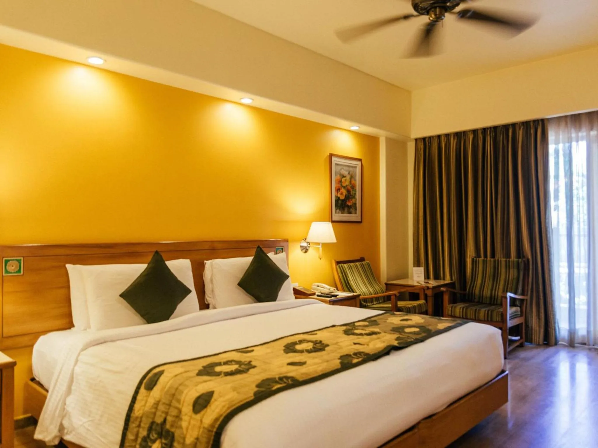 Photo of the whole room, Bed in Acron Candolim Regina