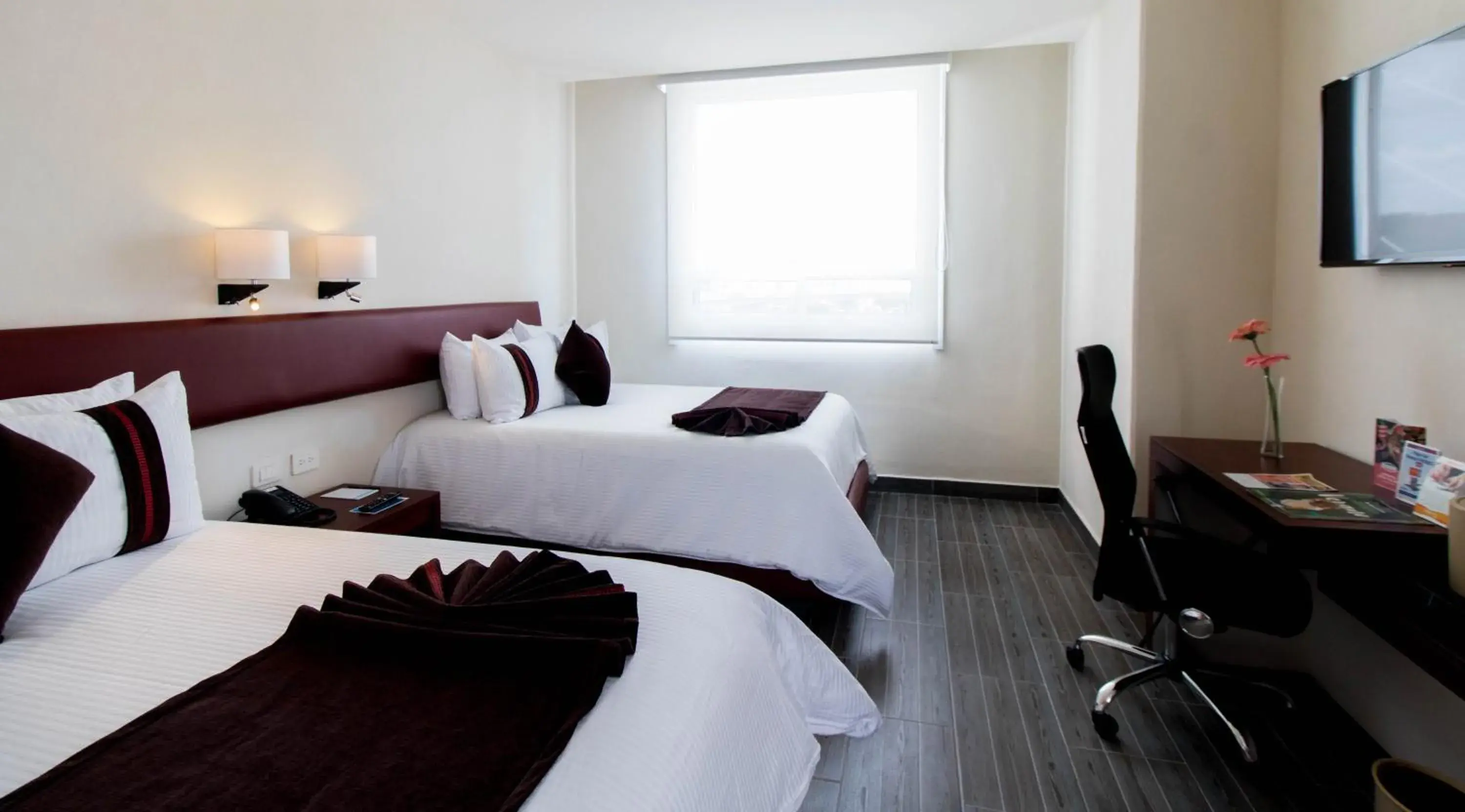 Photo of the whole room, Bed in Mision Puebla Angelopolis Photo of the whole room, Bed in Mision Puebla Angelopolis