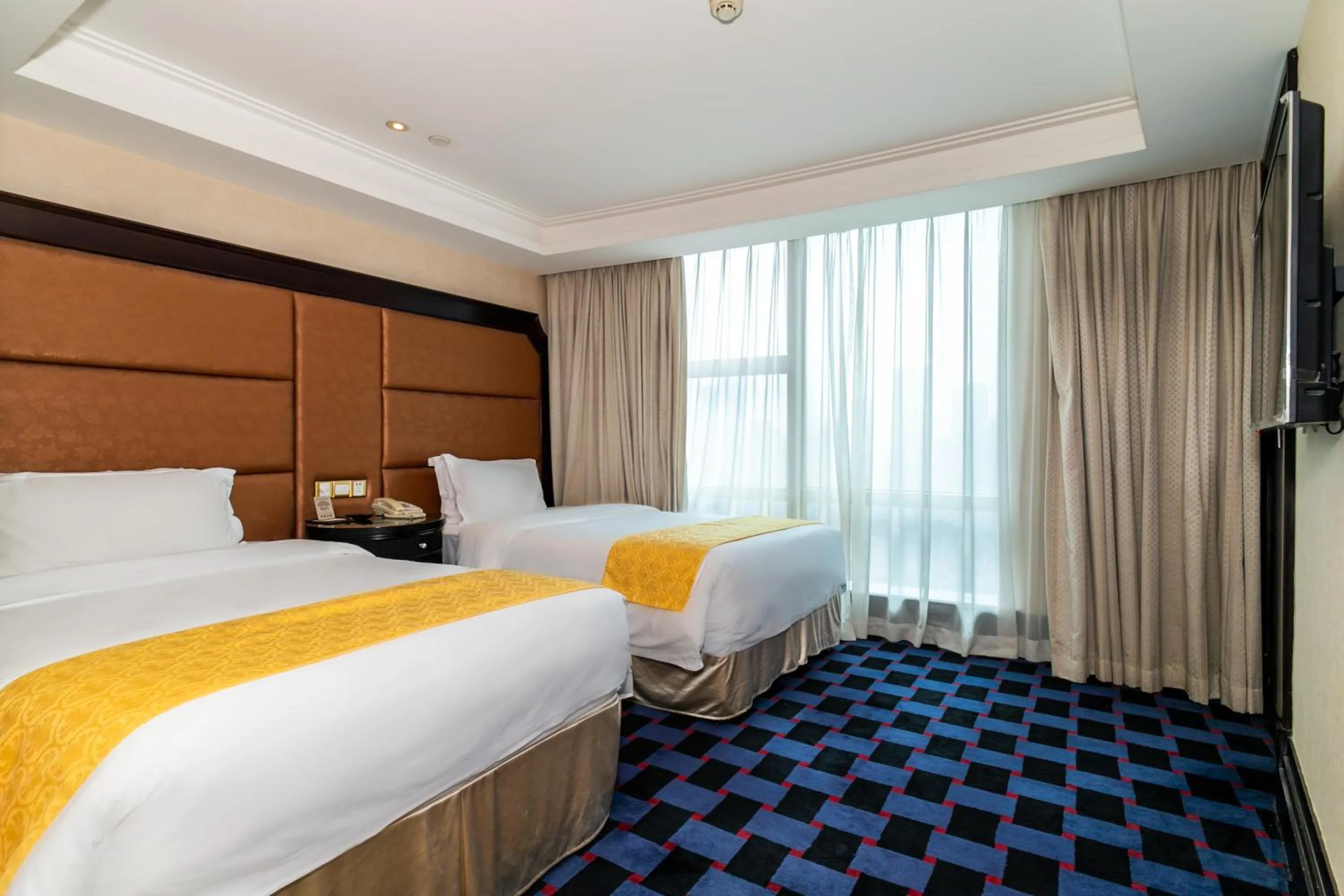 Bedroom in Royal Mediterranean Hotel