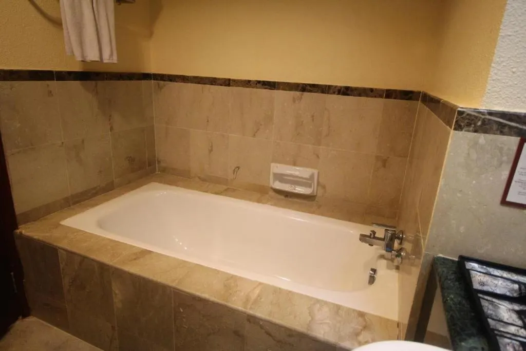 Bath in Grand Riverview Hotel