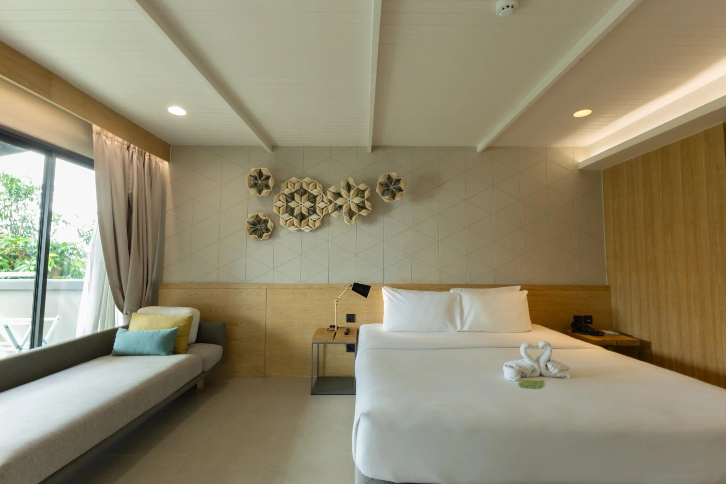Bed in Andaman Cannacia Resort & Spa - SHA Extra Plus