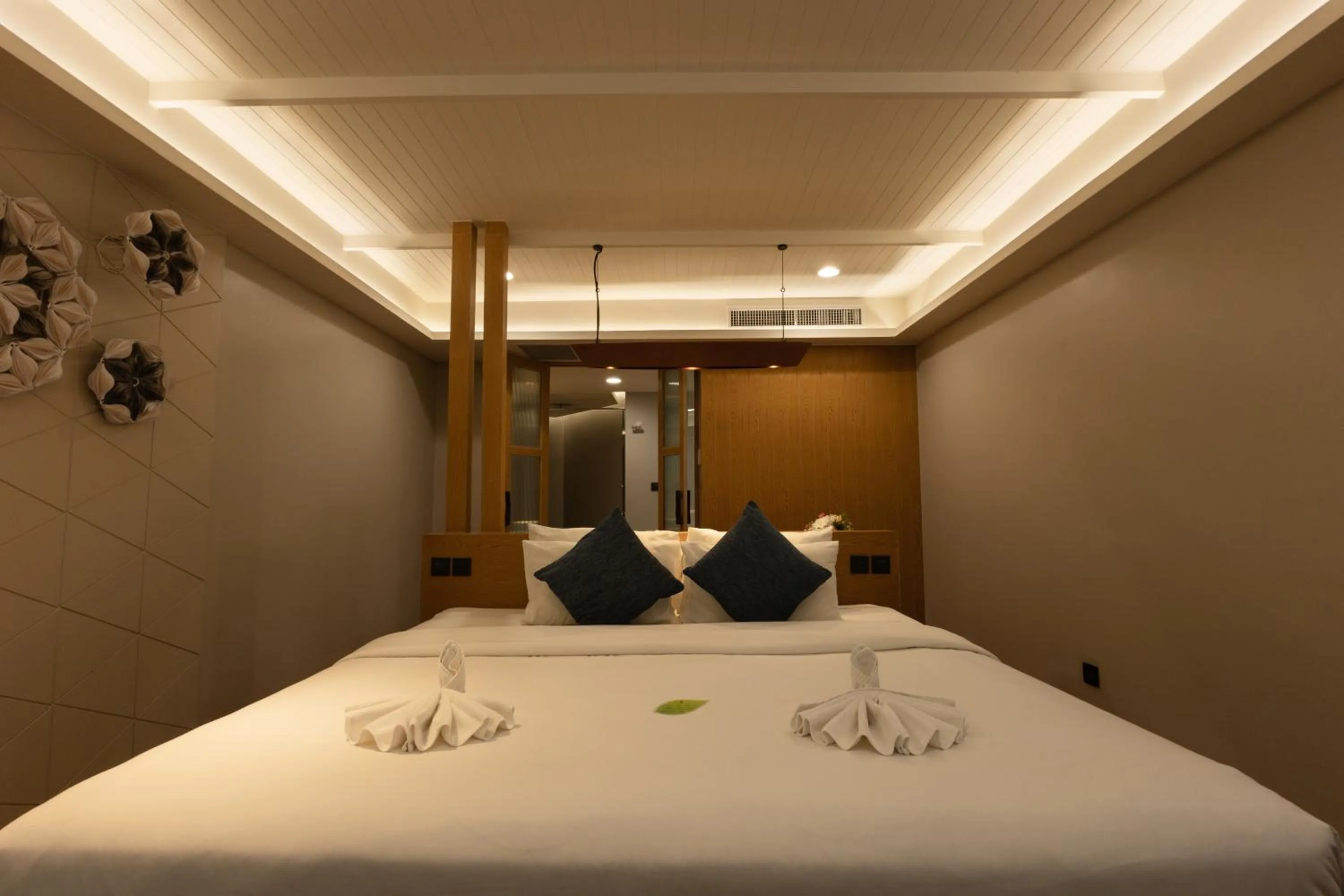 Bed in Andaman Cannacia Resort & Spa - SHA Extra Plus