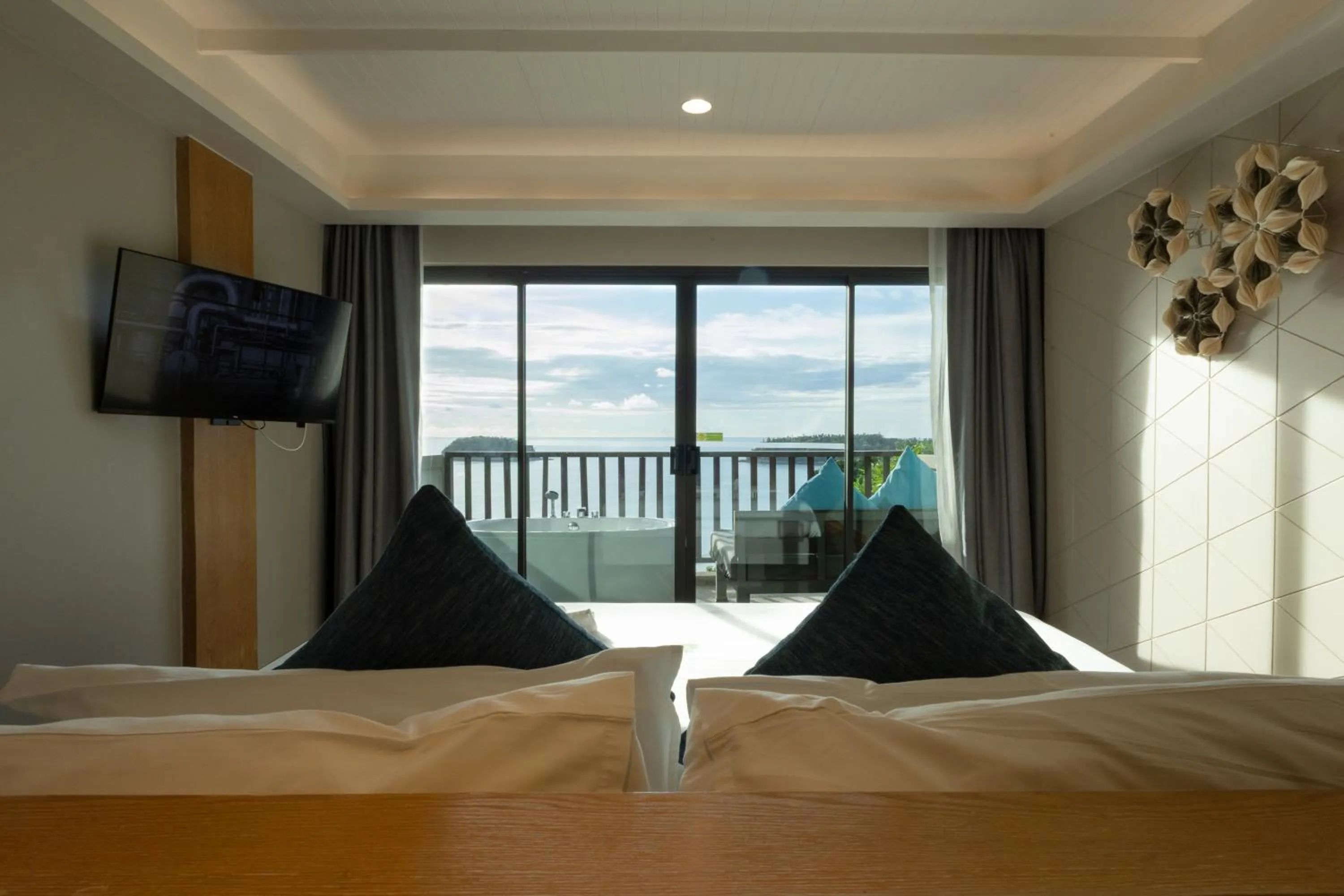 Bed in Andaman Cannacia Resort & Spa - SHA Extra Plus