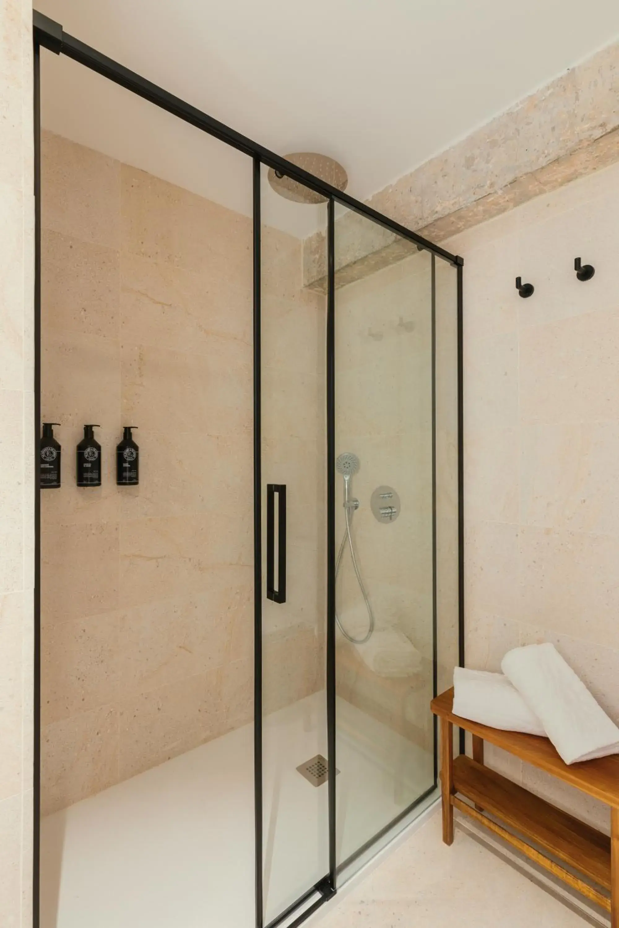 Shower, Bed in Paya Suites Shower, Bed in Paya Suites