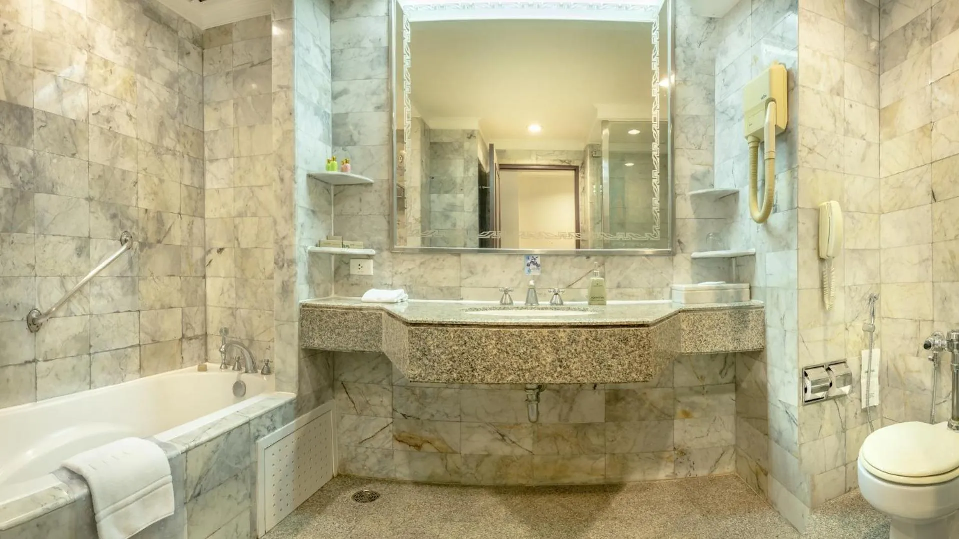 Bathroom in Ramada by Wyndham Bangkok Chaophya Park