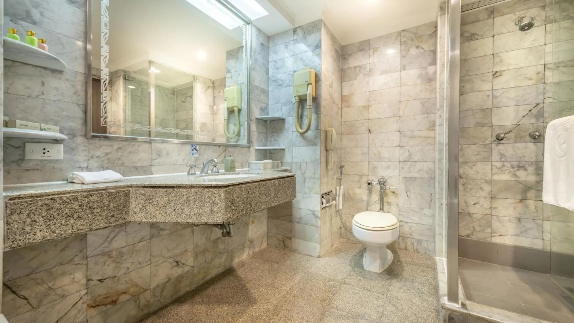 Bathroom in Ramada by Wyndham Bangkok Chaophya Park