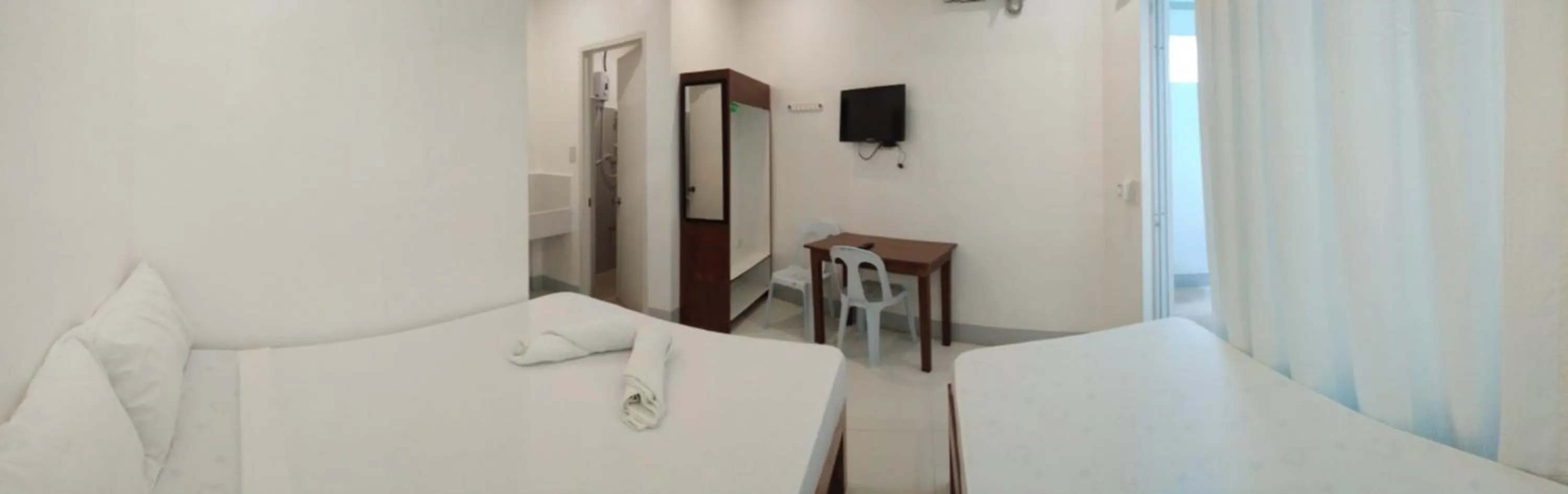 Bed in Neela Tourist Lodge