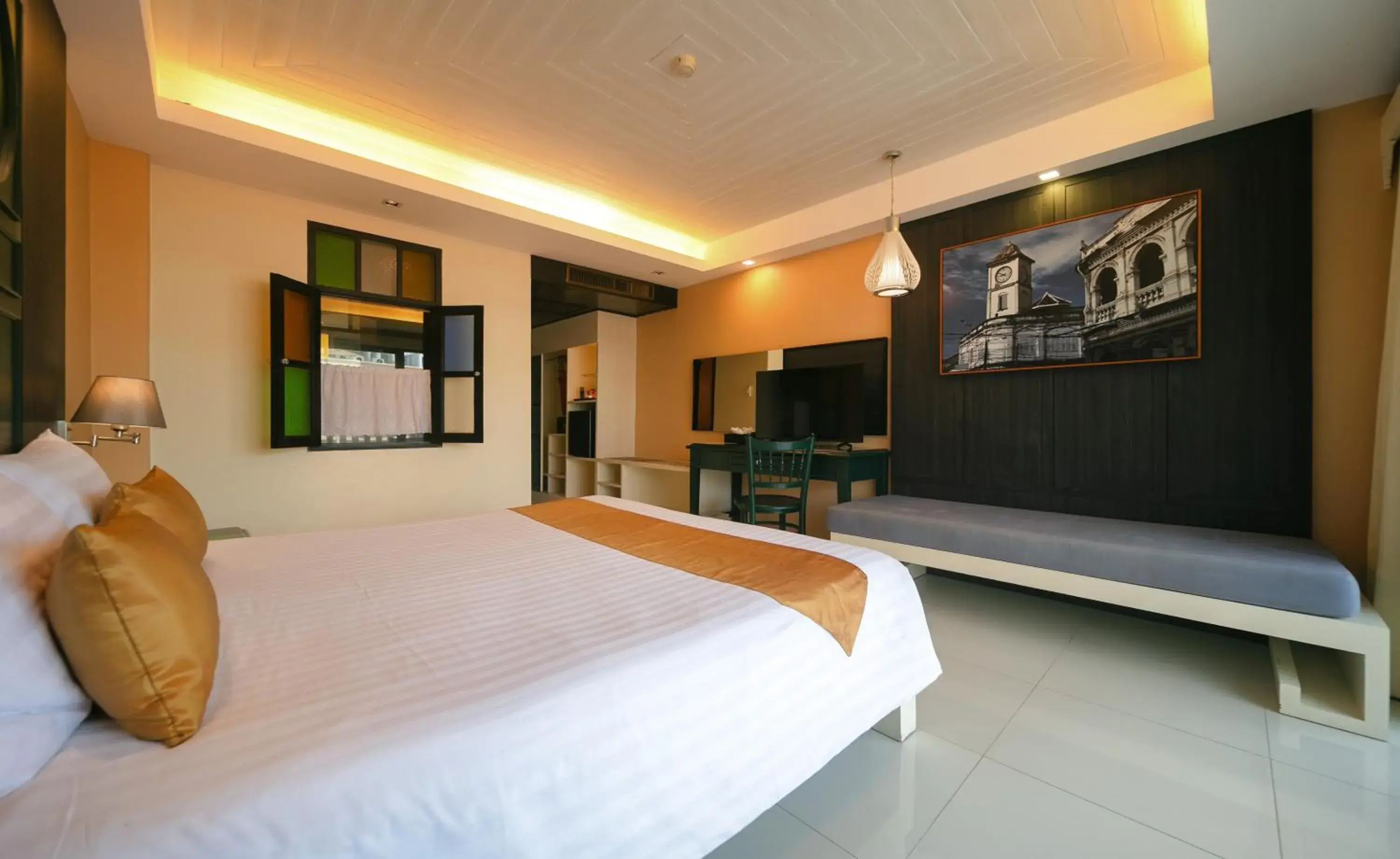 Bed in The Old Phuket - Karon Beach Resort Bed in The Old Phuket - Karon Beach Resort