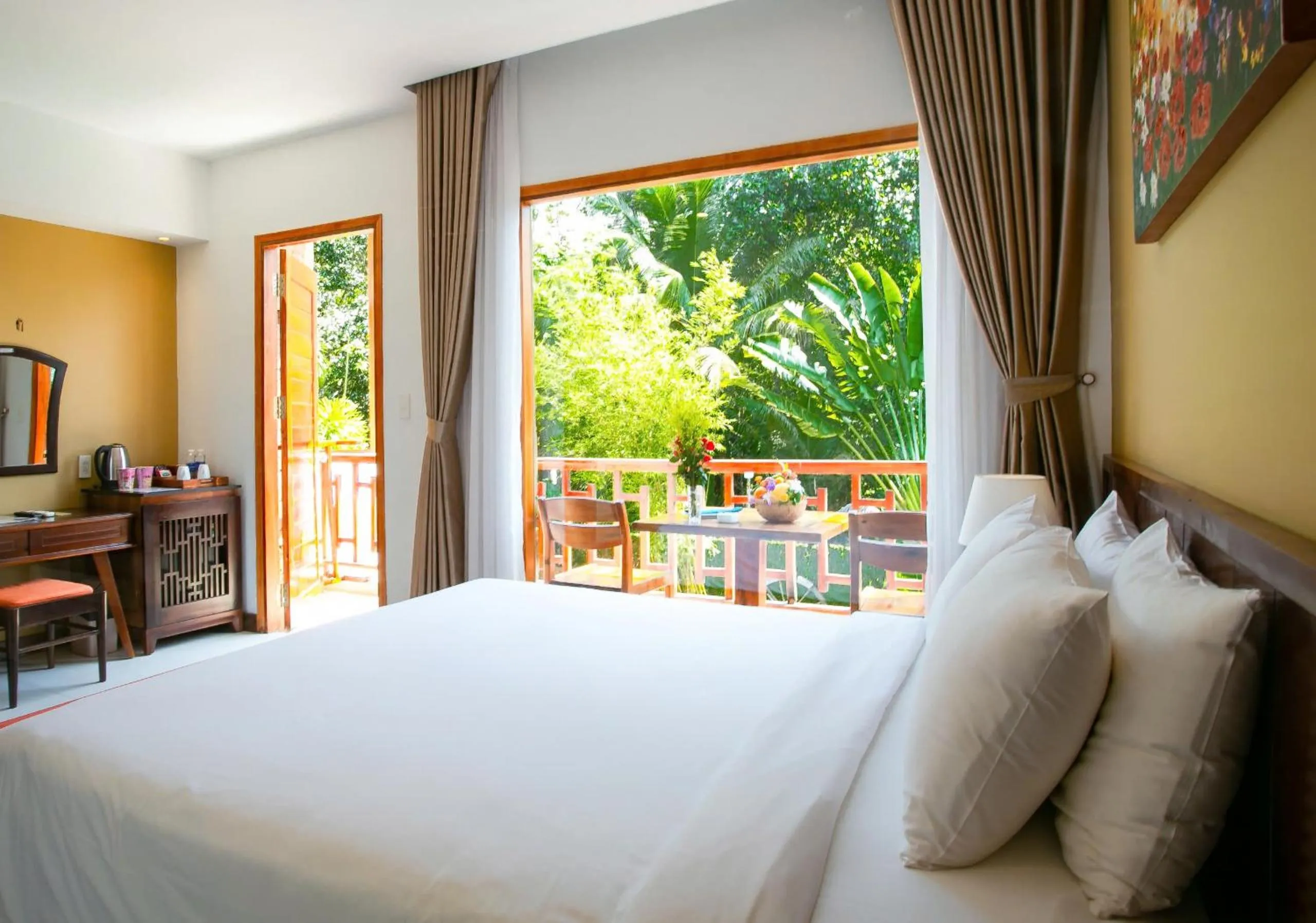 Bed in Nadine Phu Quoc Resort & Spa