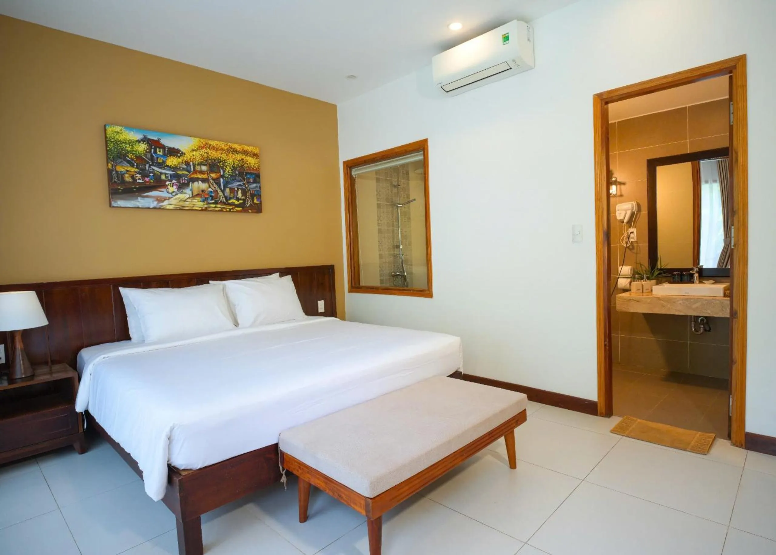 Bed in Nadine Phu Quoc Resort & Spa