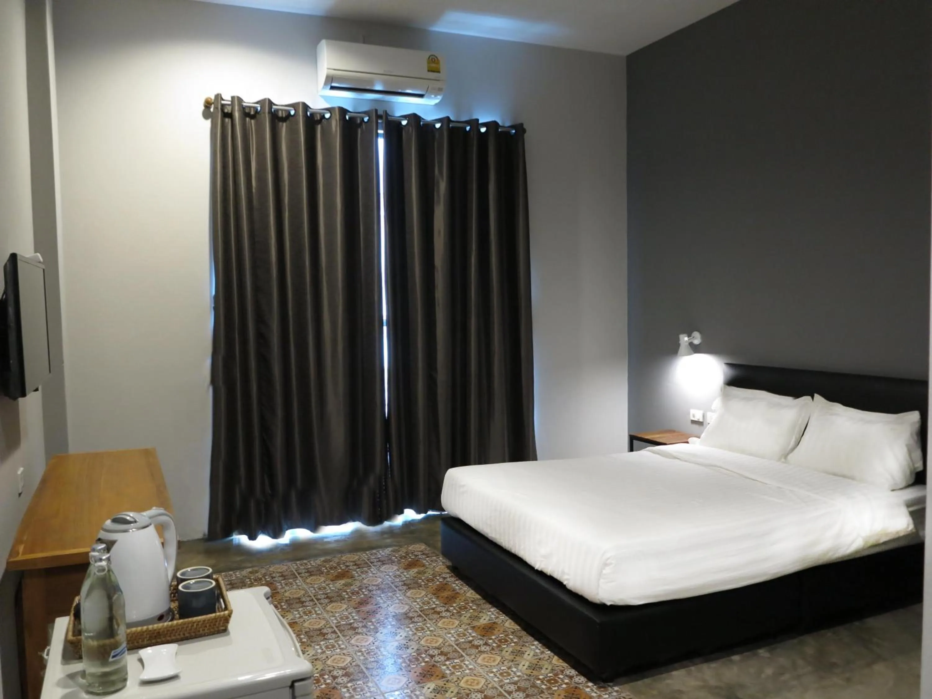 Photo of the whole room, Bed in Nornlamphun Boutique Hotel